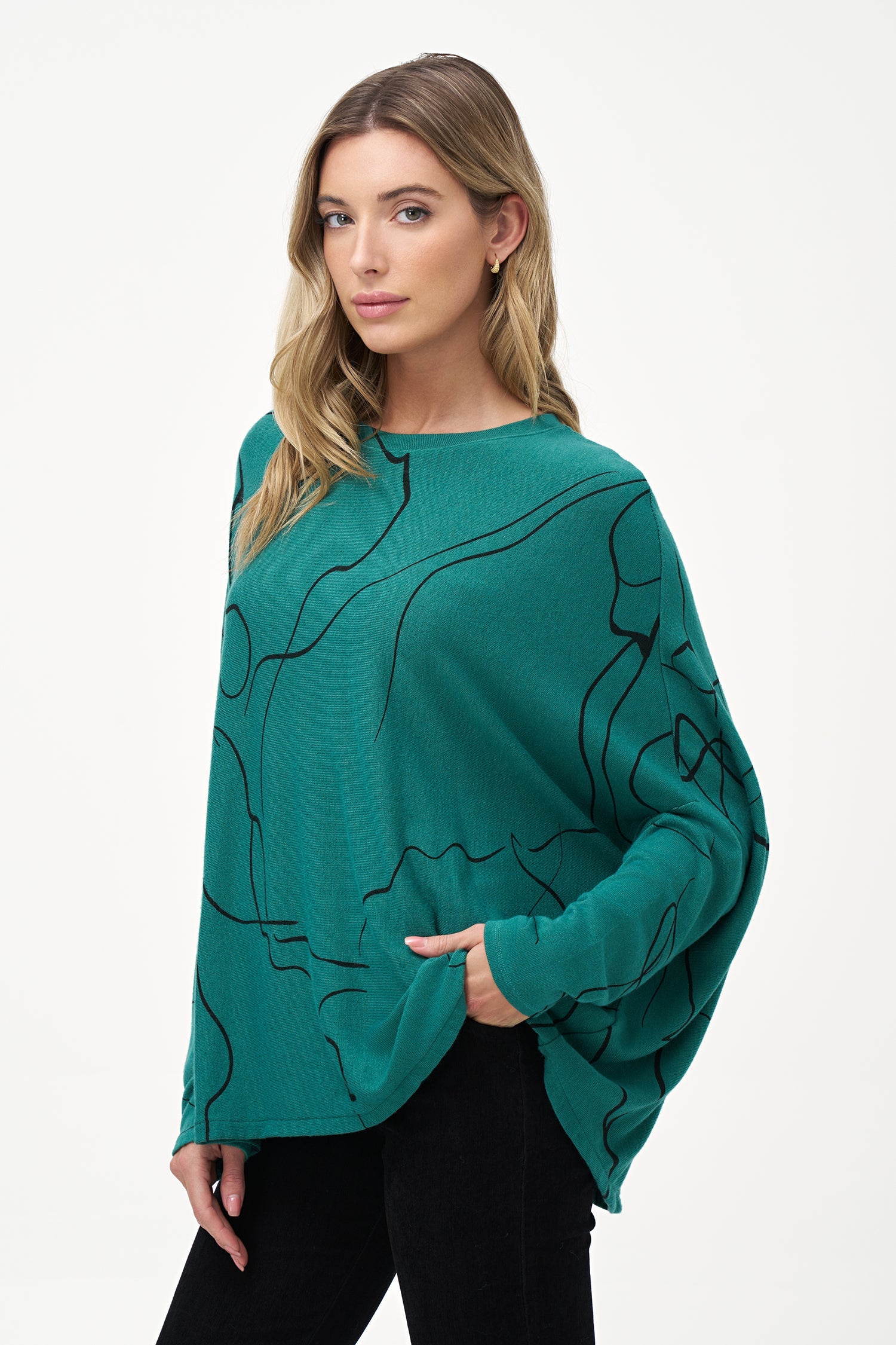 Women's knit long sleeve oversized  top, with a wide crew-neckline and a dropped shoulder