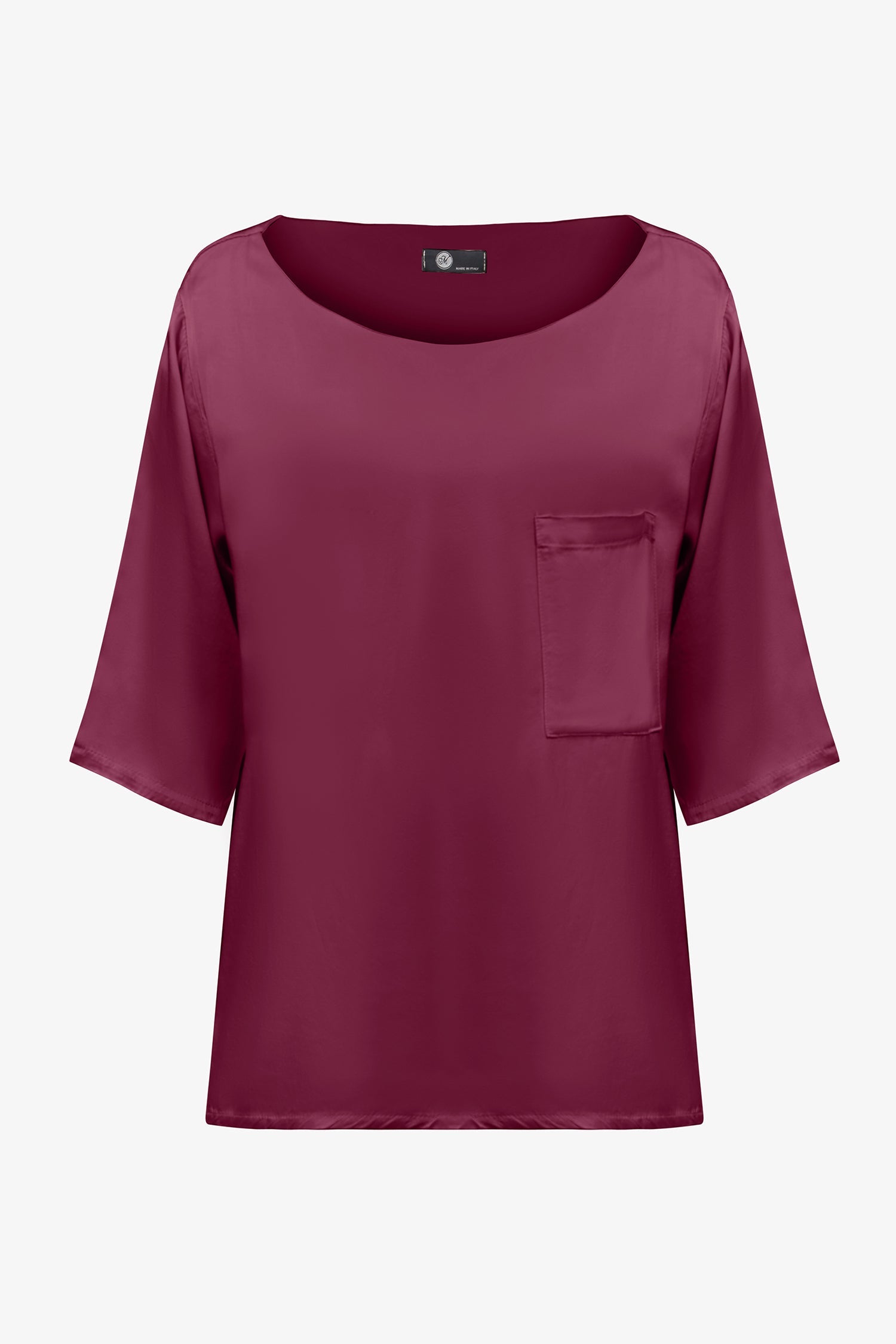 Women’s woven boat-neck top, with elbow length sleeves and a pocket at the chest