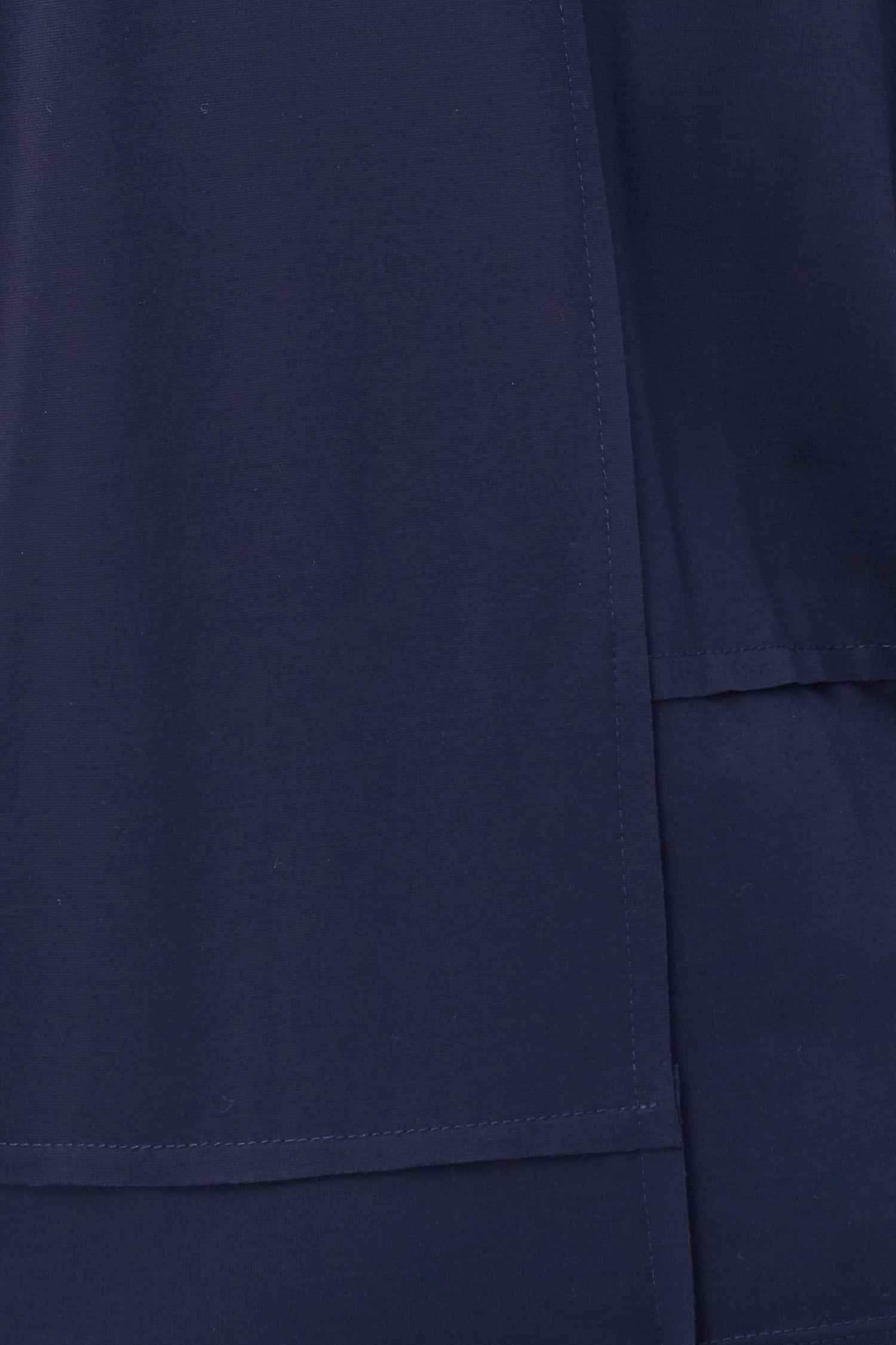 Women's knit v-neckline top, with 3/4th length sleeves and an asymmetrical hemline
