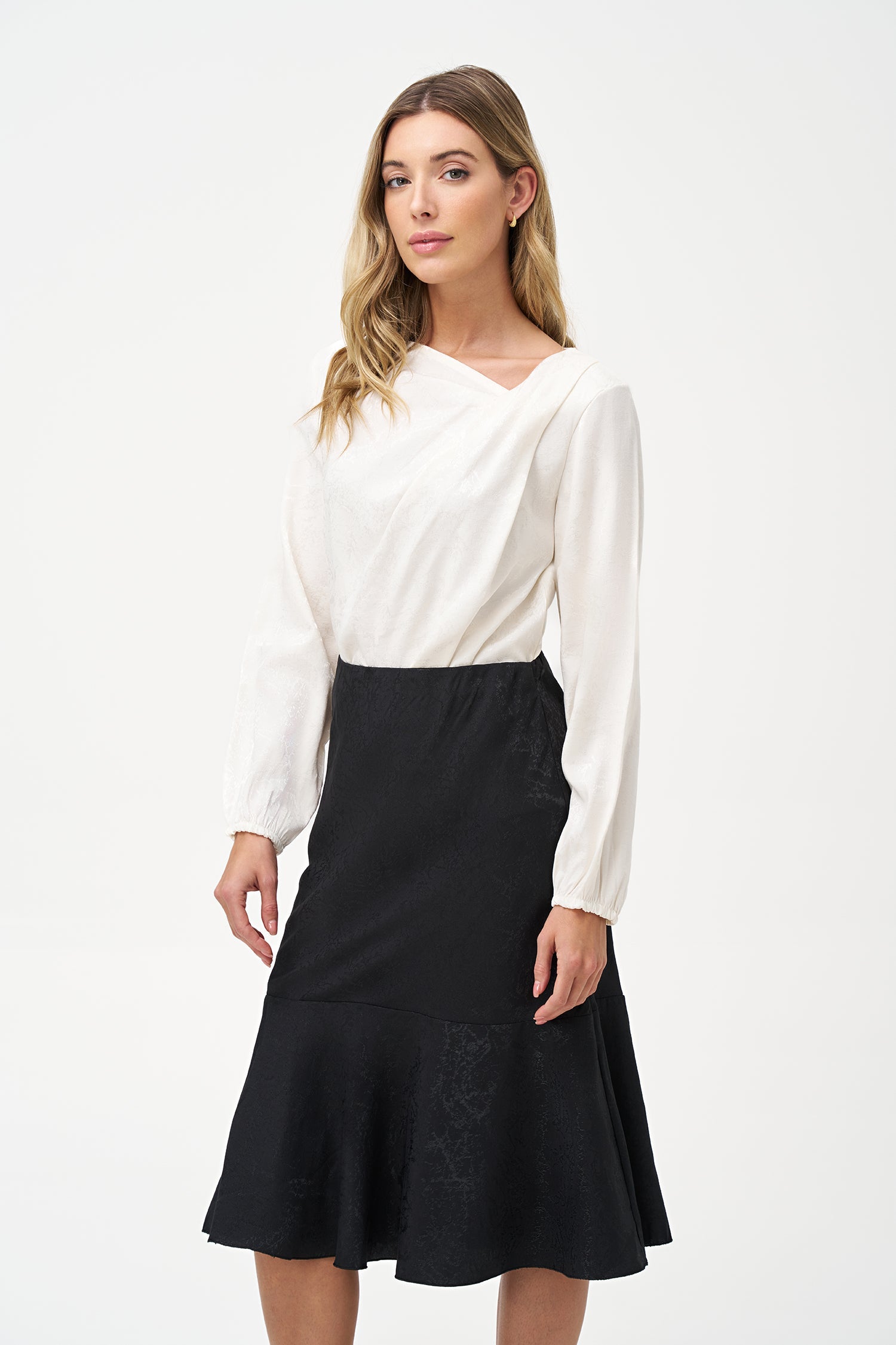 Women’s woven long sleeve top, with an asymmetrical collar