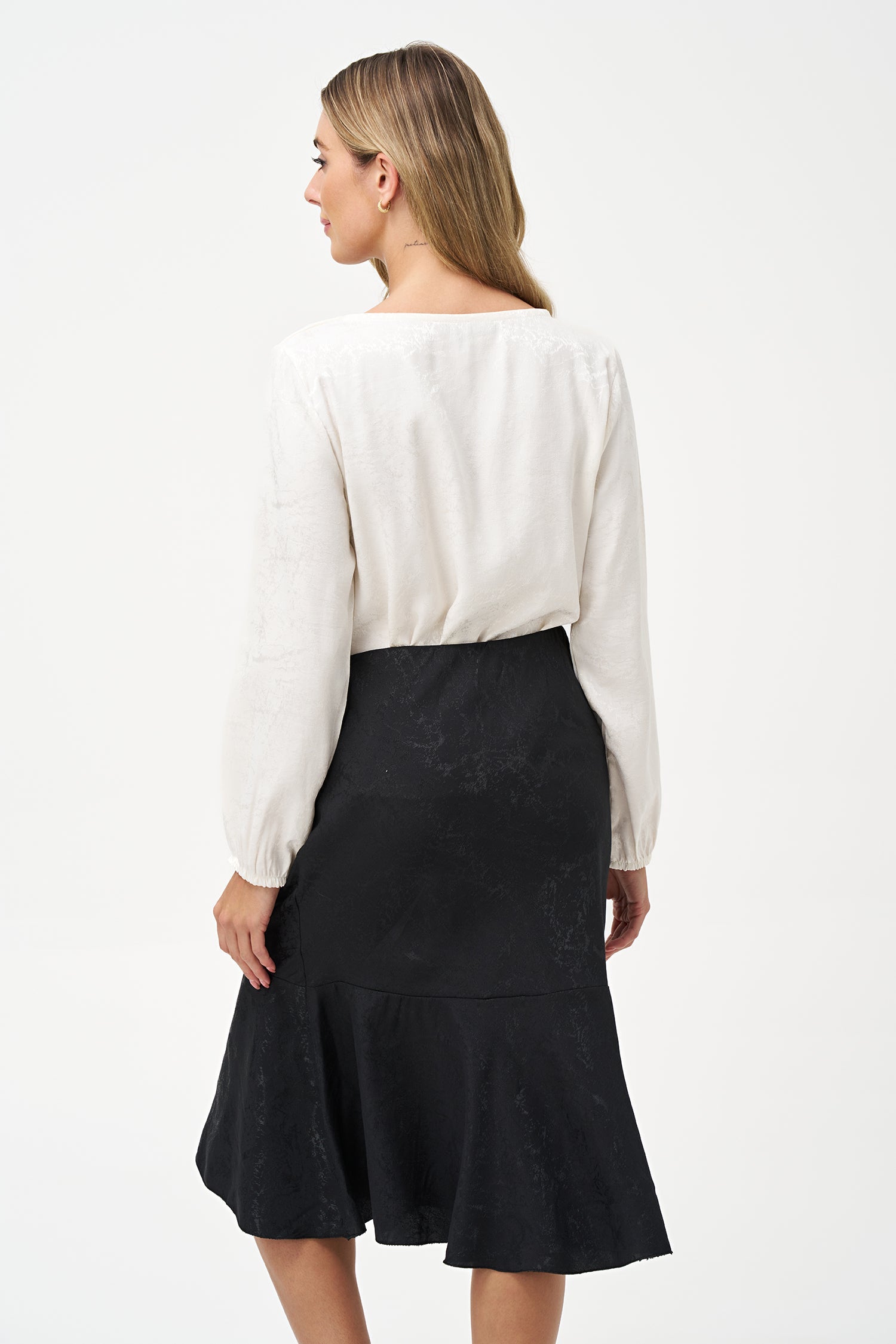 Women’s woven long sleeve top, with an asymmetrical collar