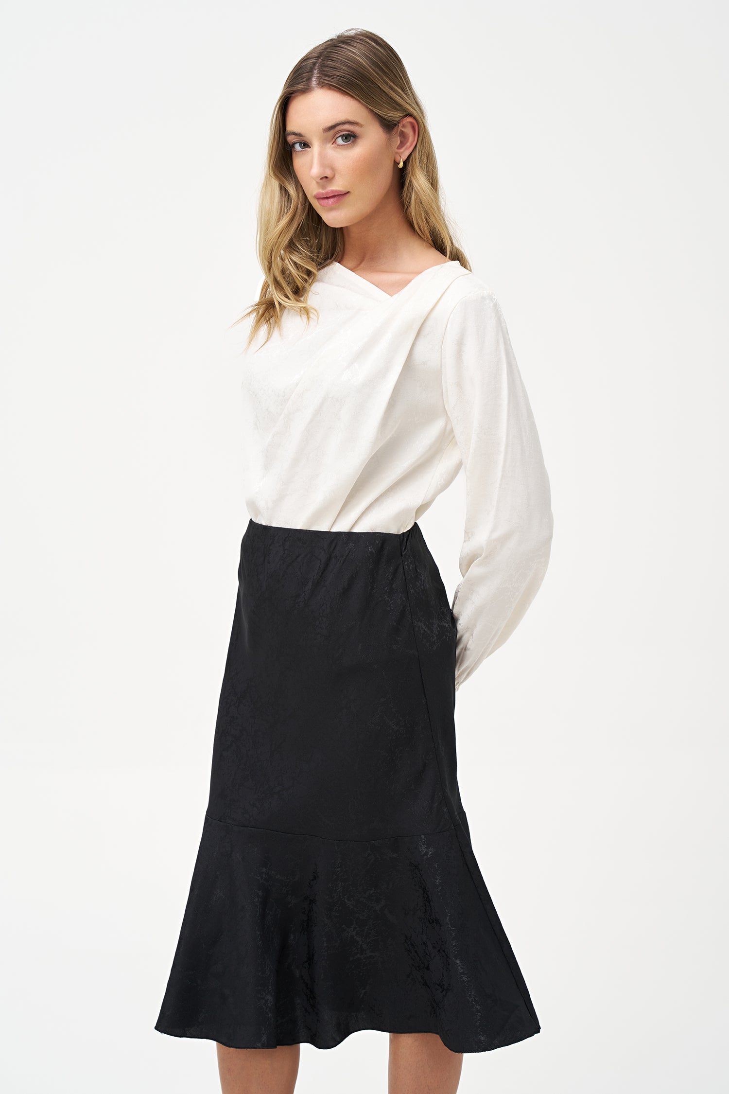 Women’s woven long sleeve top, with an asymmetrical collar