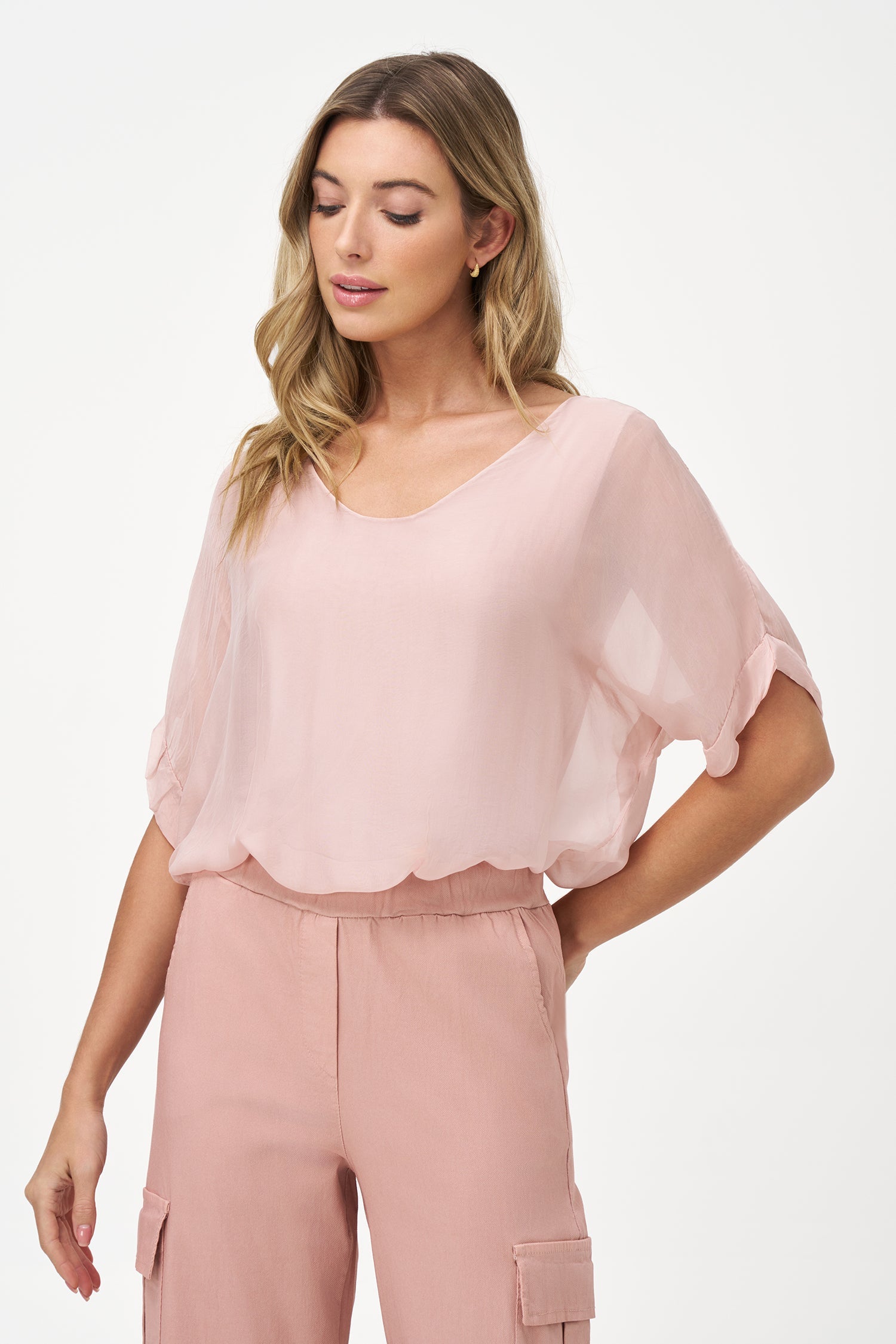 Women’s woven v-neckline top, with elbow length sleeves