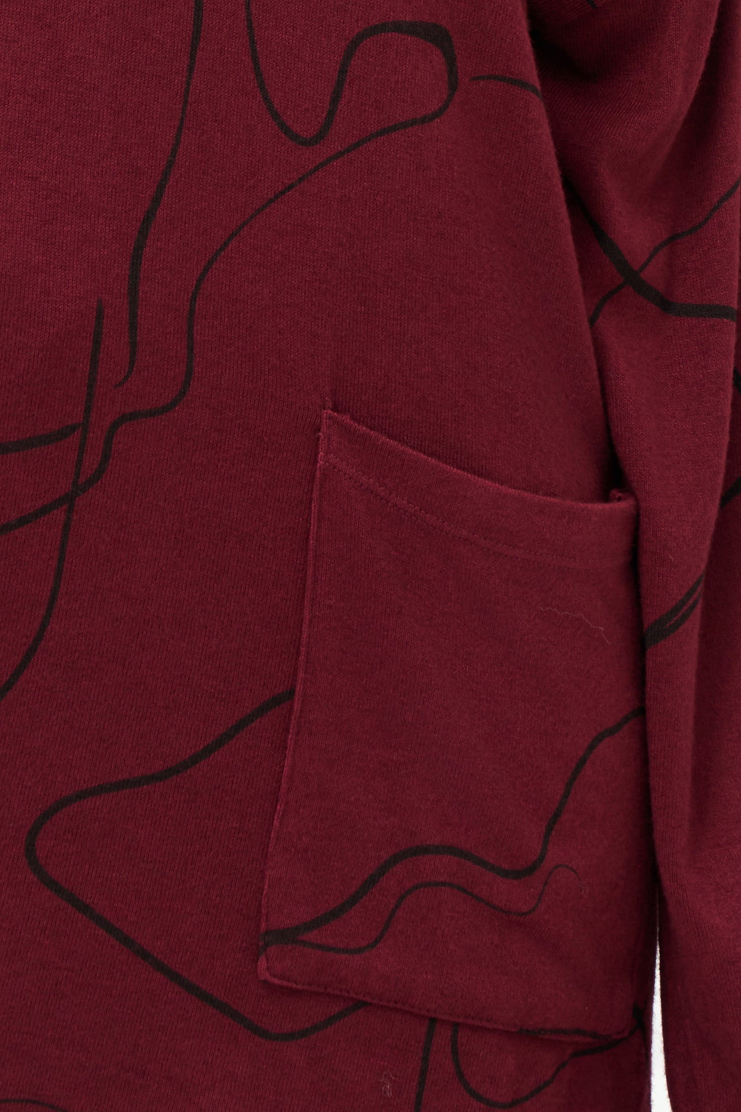Women's knit wide neck tunic, with patch pockets and long sleeves with a dropped shoulder