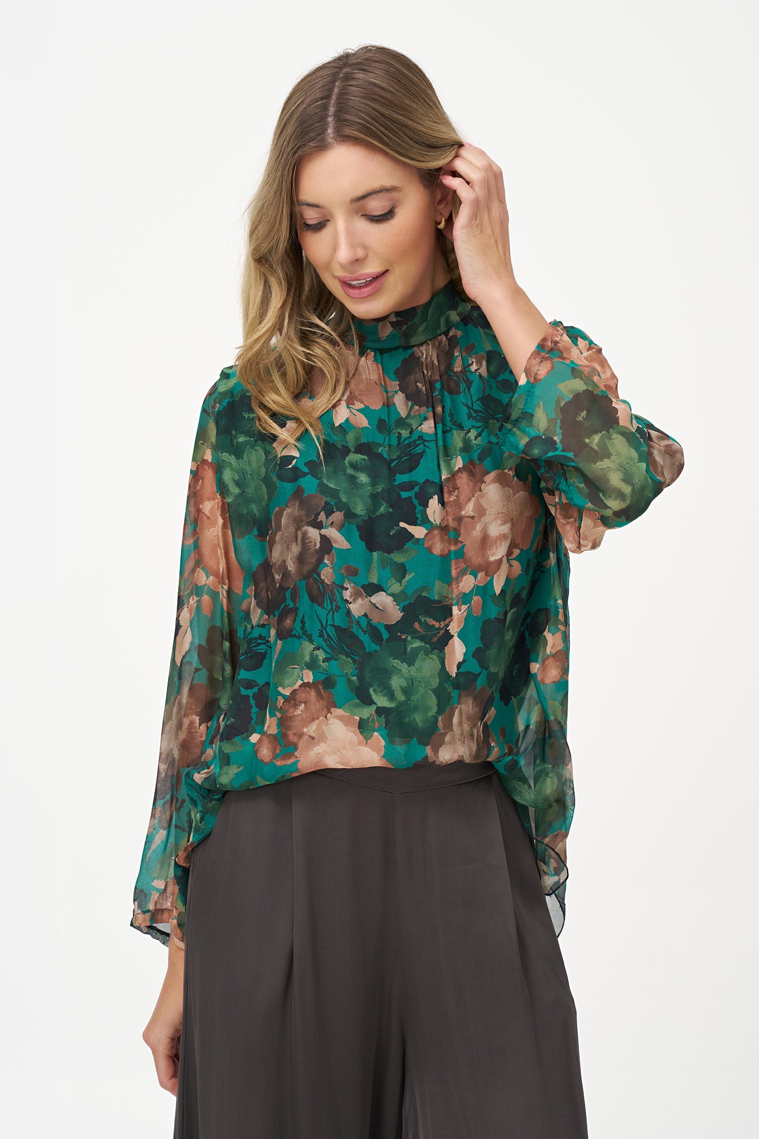 Women’s woven tunic, with long sleeves, a self-tie mock-neckline and a hi-low hemline