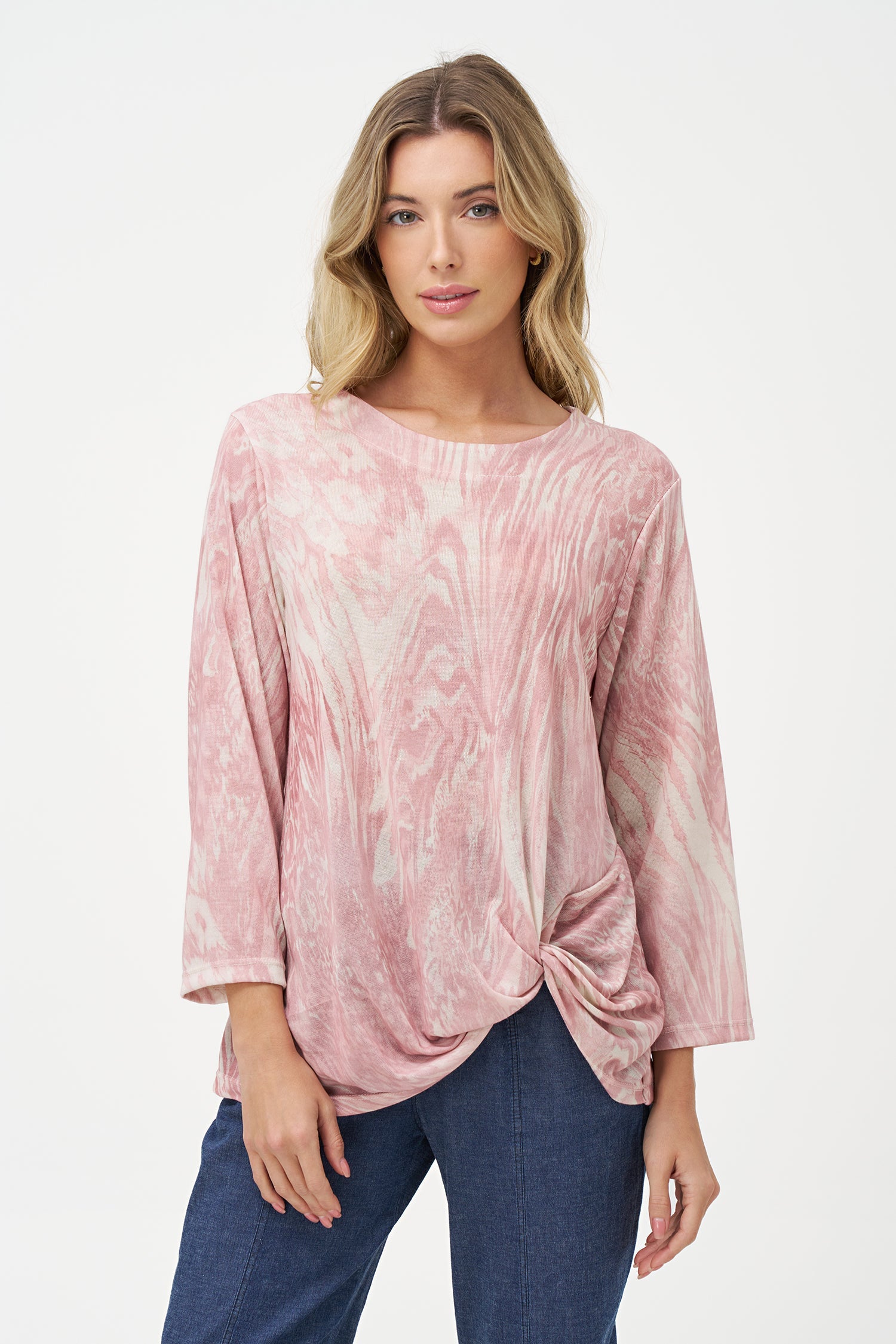 Women's knit wide crew-neckline  tunic, with long sleeves and a twisted front hemline