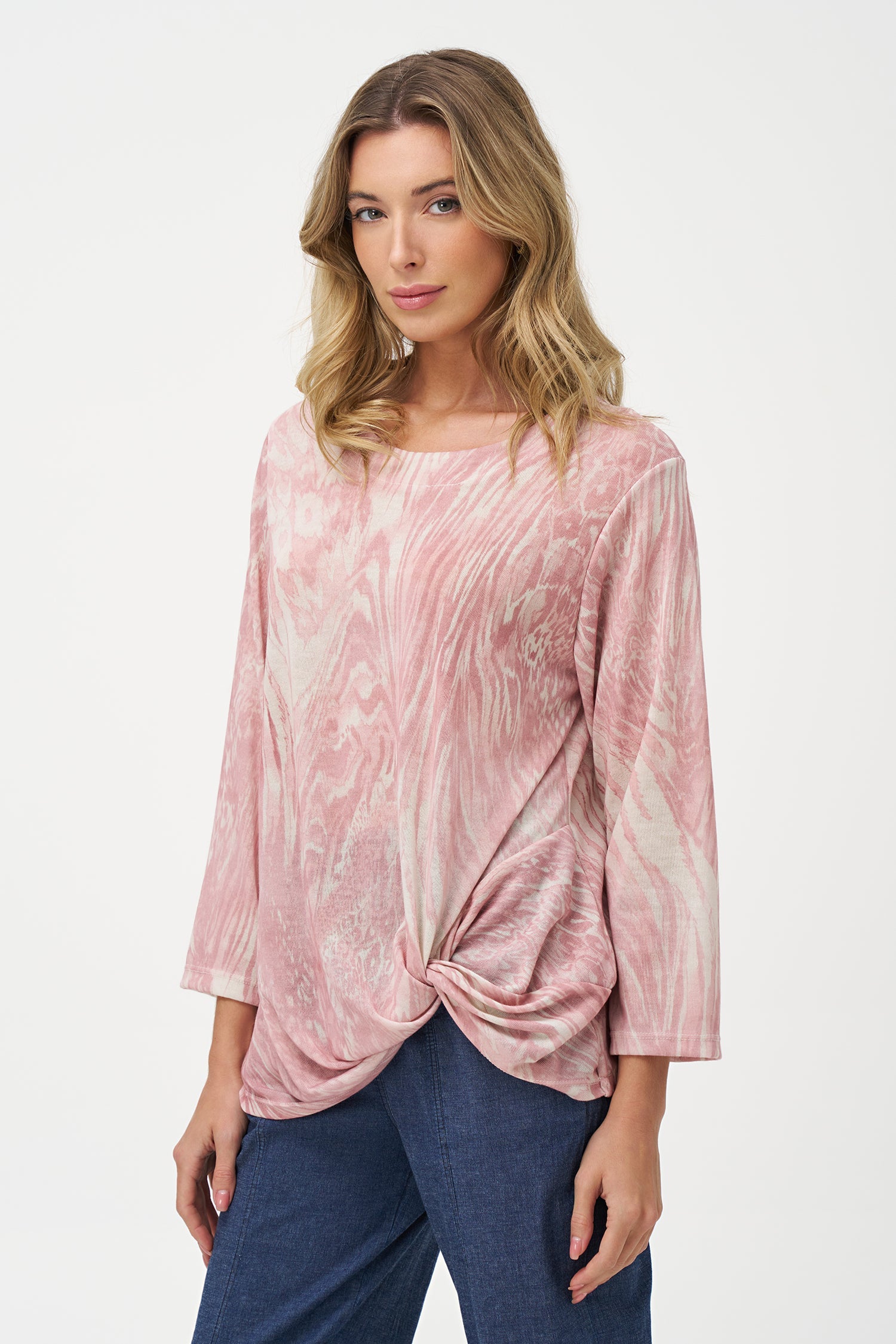 Women's knit wide crew-neckline  tunic, with long sleeves and a twisted front hemline