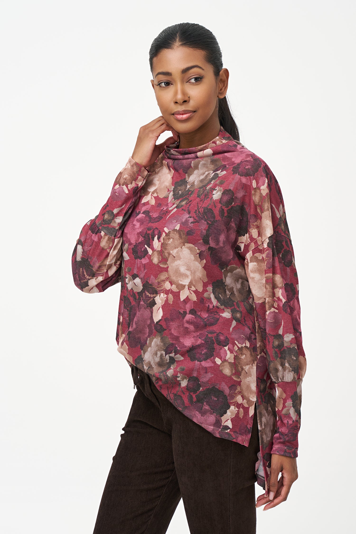 Women's knit long sleeve  tunic, with a cowl turtle-neck collar, and a high/low hemline with side seam slits