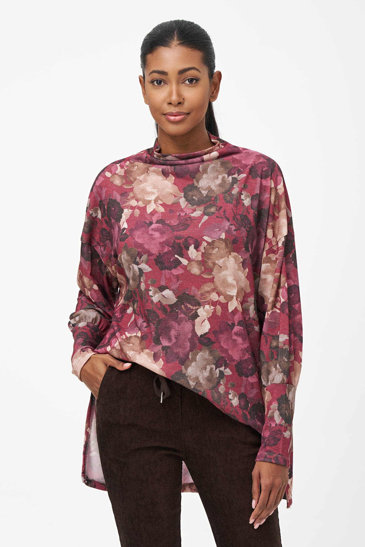 Women's knit long sleeve  tunic, with a cowl turtle-neck collar, and a high/low hemline with side seam slits