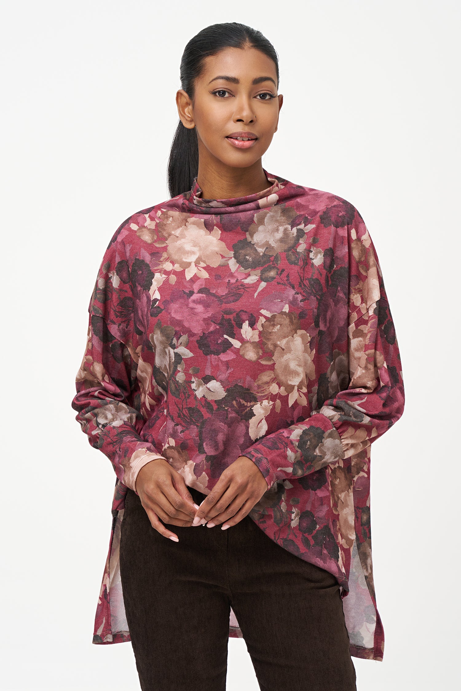 Women's knit long sleeve  tunic, with a cowl turtle-neck collar, and a high/low hemline with side seam slits