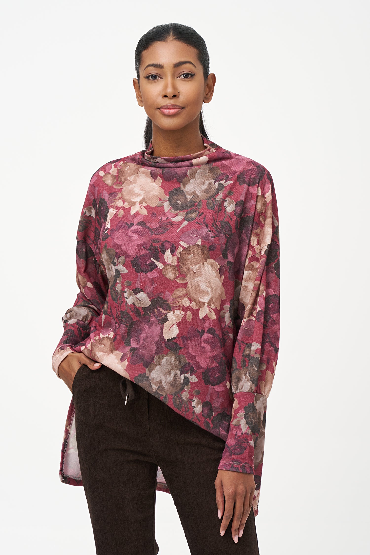 Women's knit long sleeve  tunic, with a cowl turtle-neck collar, and a high/low hemline with side seam slits