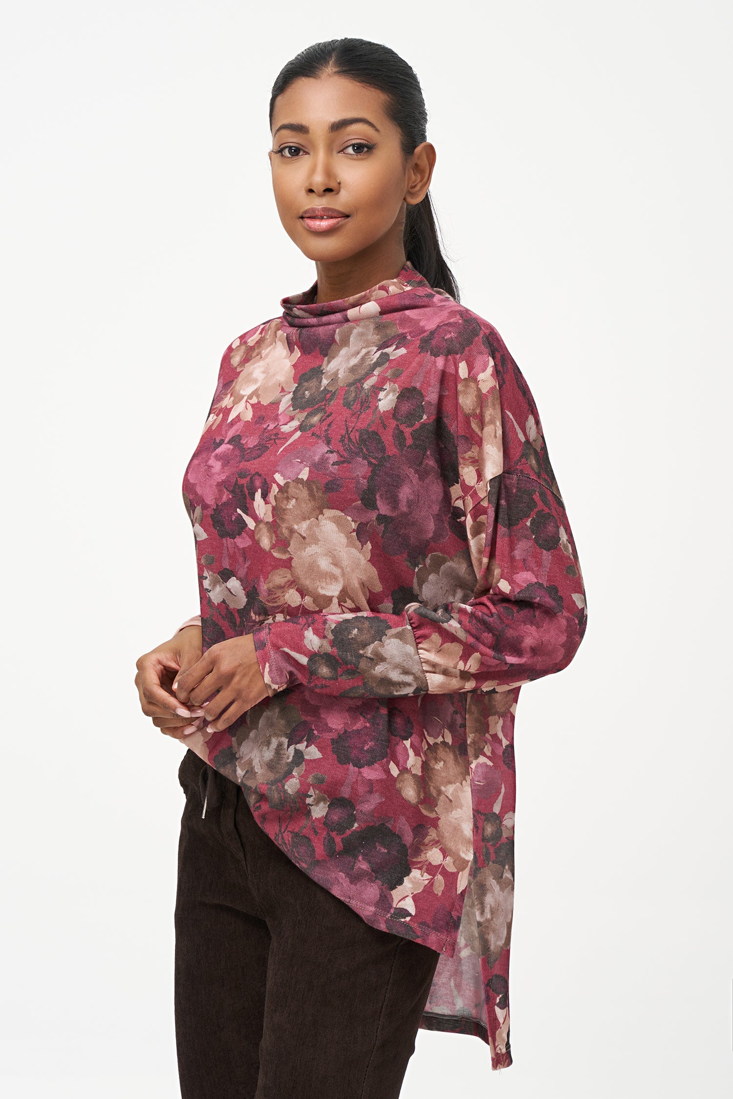 Women's knit long sleeve  tunic, with a cowl turtle-neck collar, and a high/low hemline with side seam slits