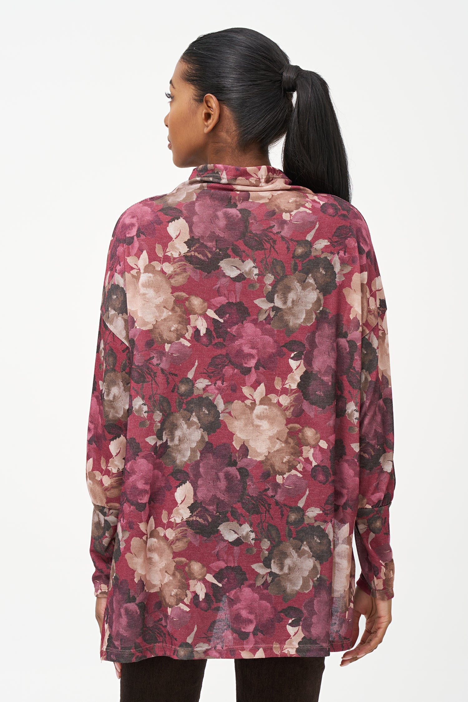 Women's knit long sleeve  tunic, with a cowl turtle-neck collar, and a high/low hemline with side seam slits