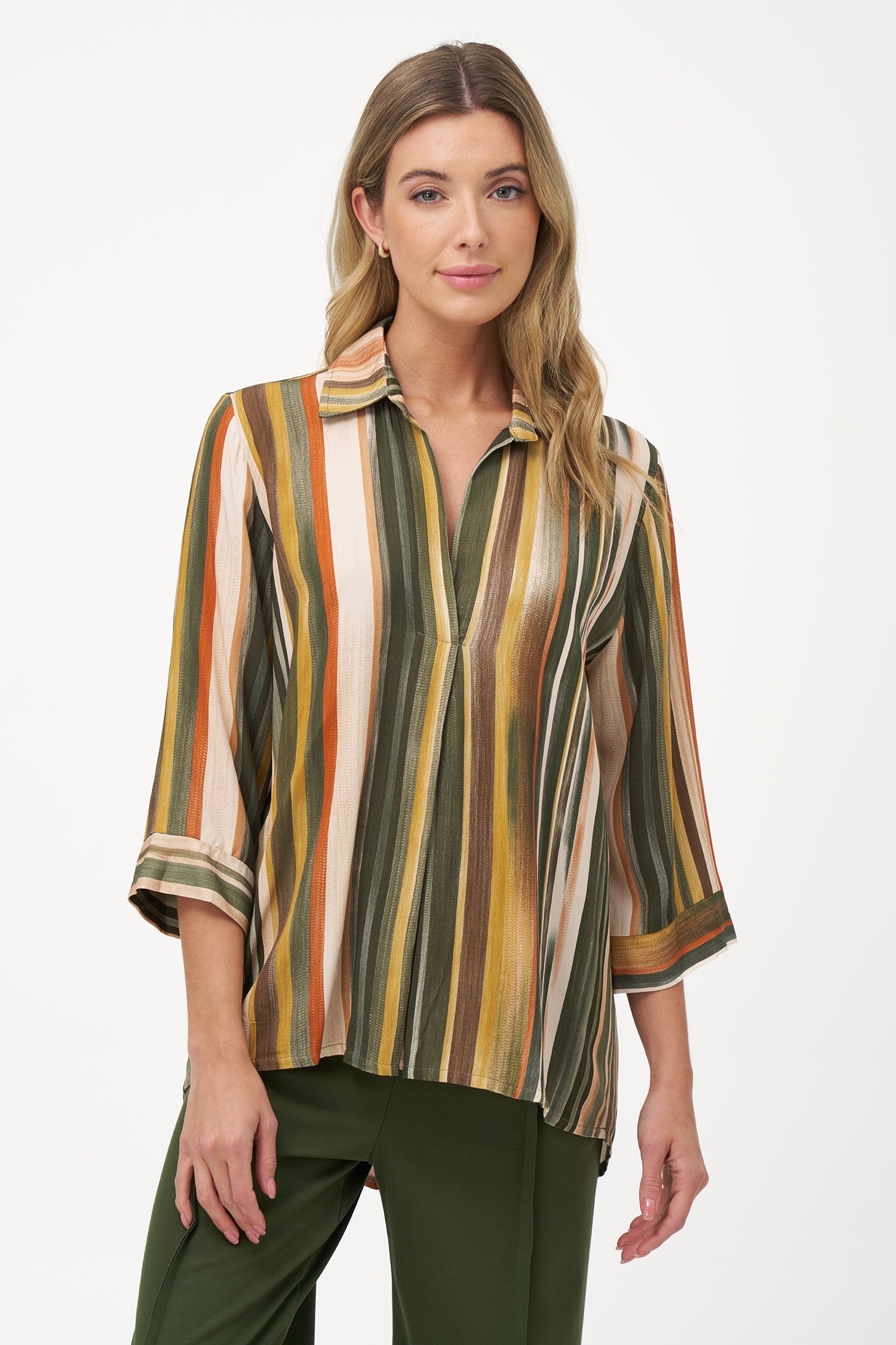 Women’s woven long sleeve v-neck tunic, with a shirt collar and a hi-low hemline