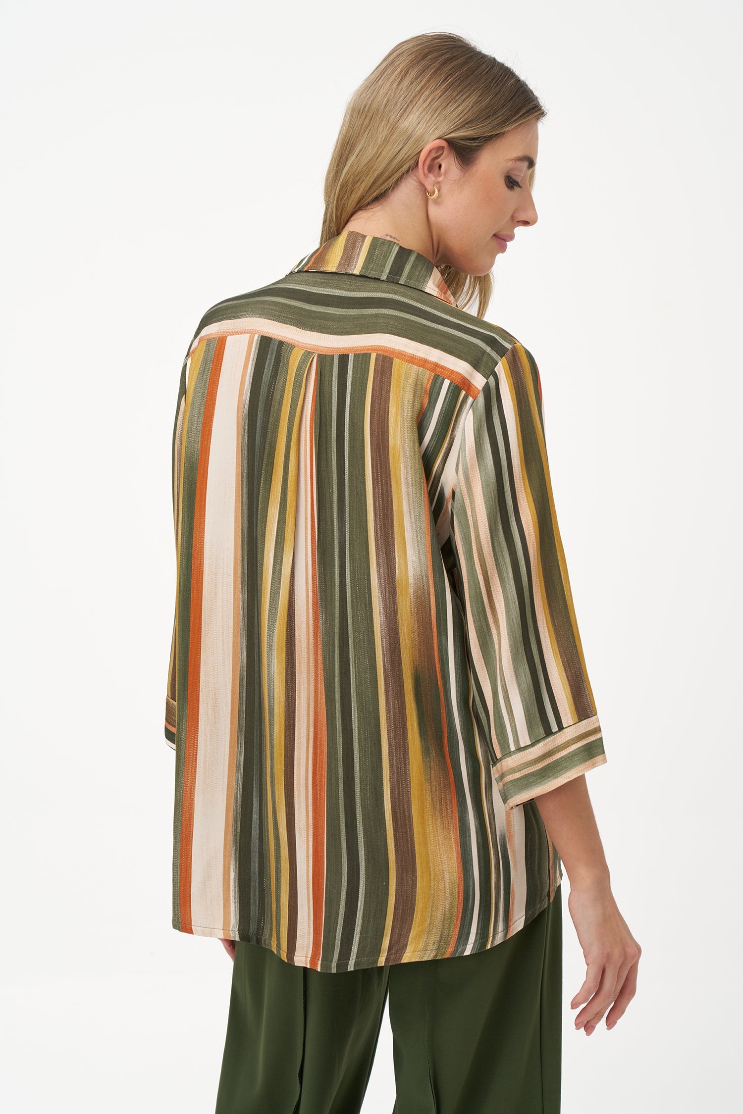 Women’s woven long sleeve v-neck tunic, with a shirt collar and a hi-low hemline