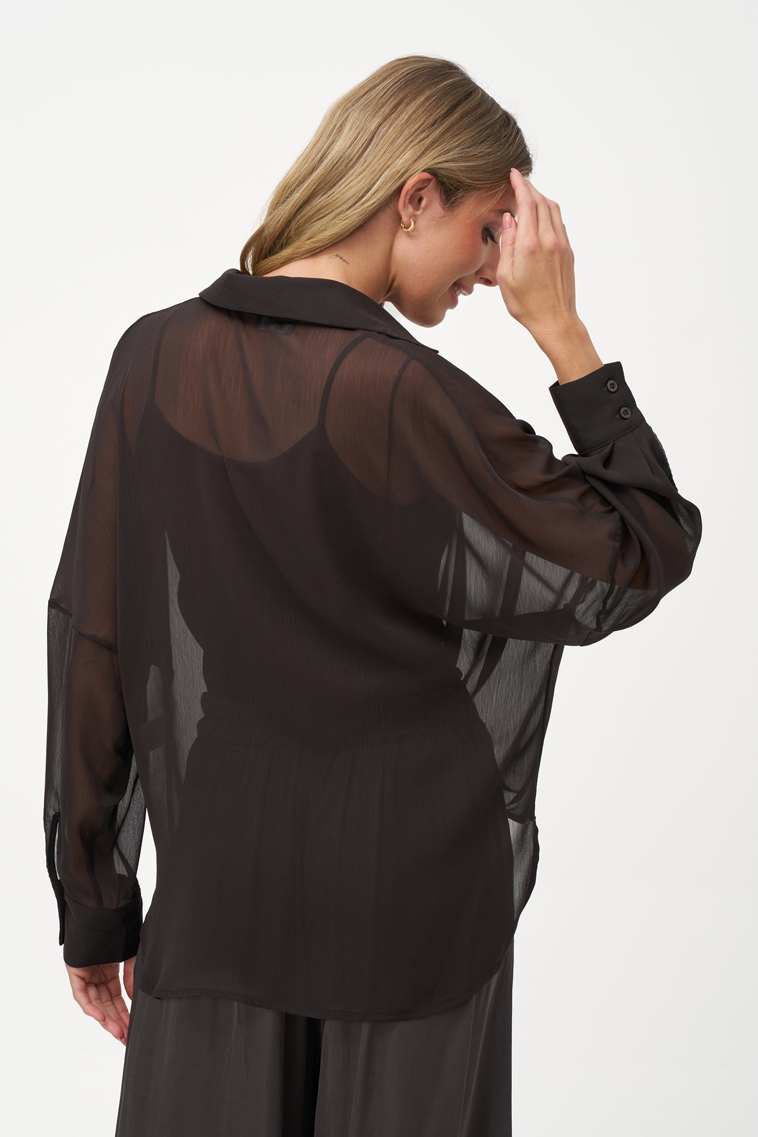 Women's woven sheere criss-cross long sleeve top, with a shirt collar and a separate tank-top under-garment