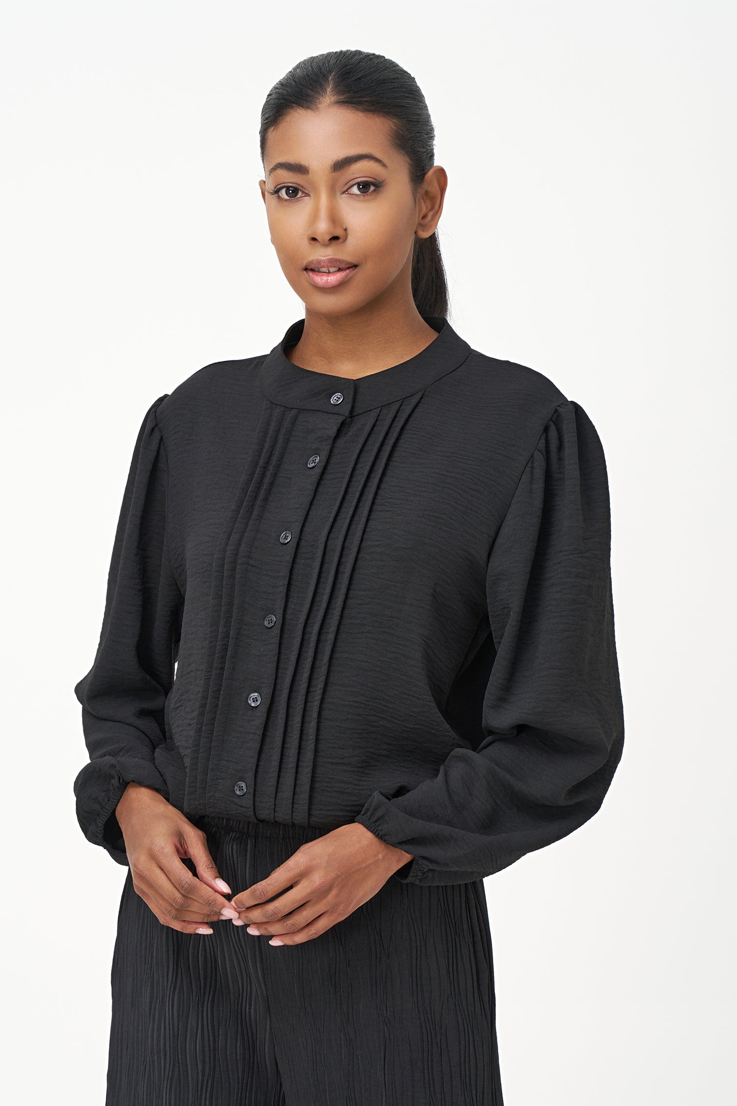 Women's woven button down shirt with a front pin-tuck detailing