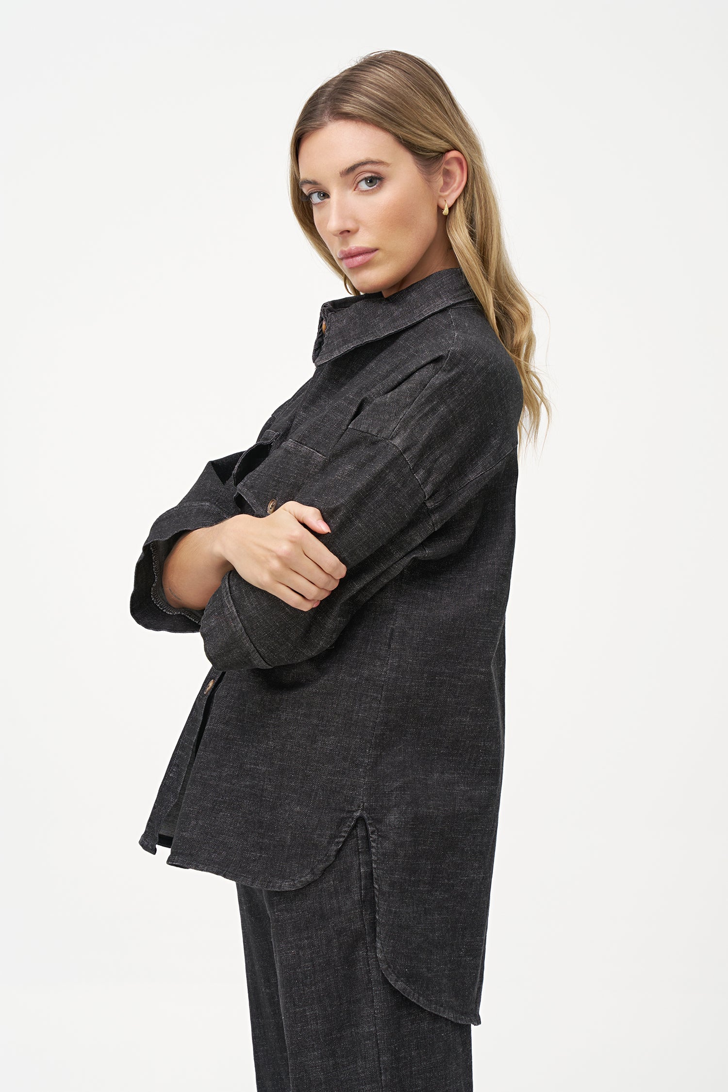 Women's woven denim button-down shirt, with elbow length sleeves and oversized patch pockets