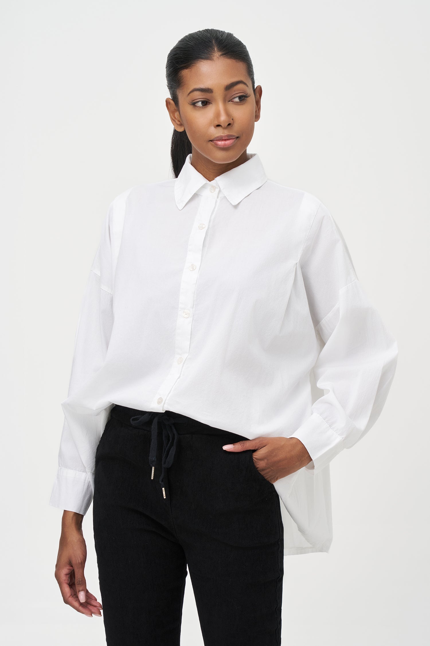 Women's woven button-down long sleeve shirt, with a pleated back detailing