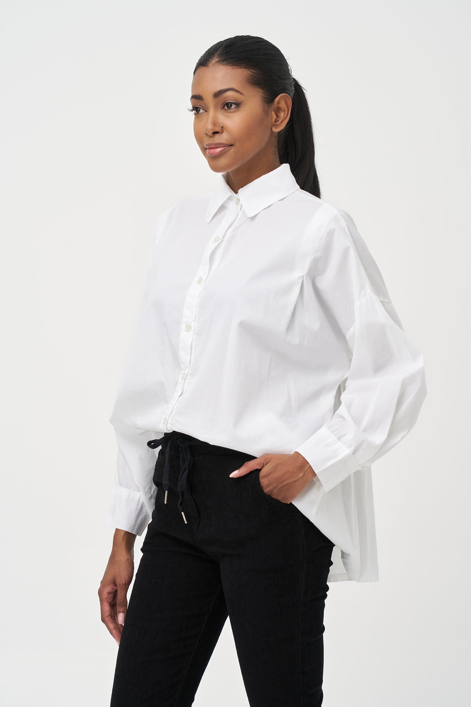 Women's woven button-down long sleeve shirt, with a pleated back detailing