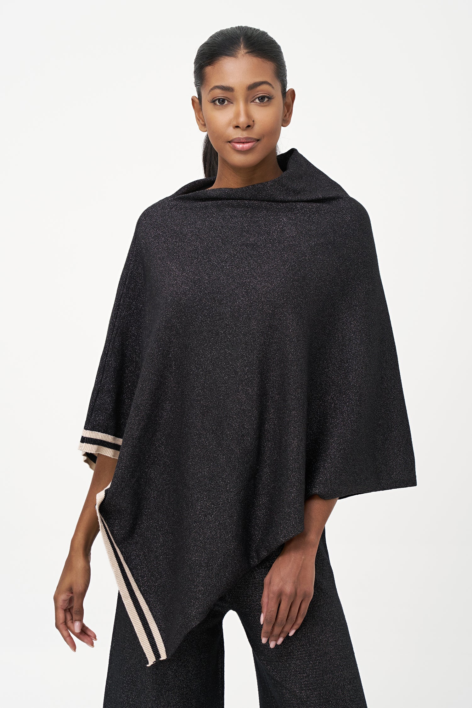 Women's knit poncho (can be worn with a cowl neck at the front, or can be worn diagonaly with a v-front hemline)
