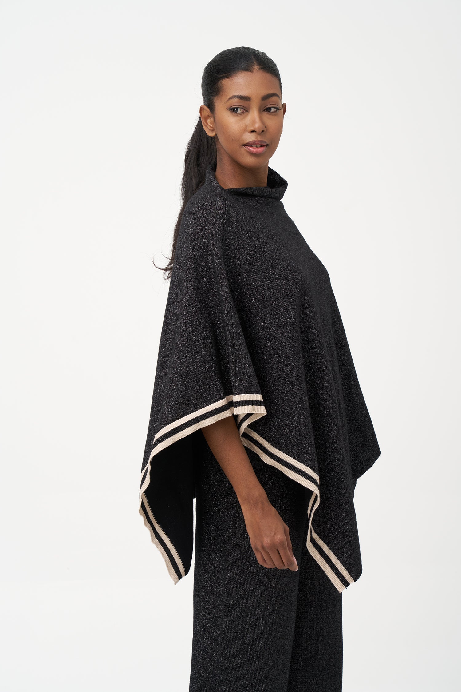 Women's knit poncho (can be worn with a cowl neck at the front, or can be worn diagonaly with a v-front hemline)