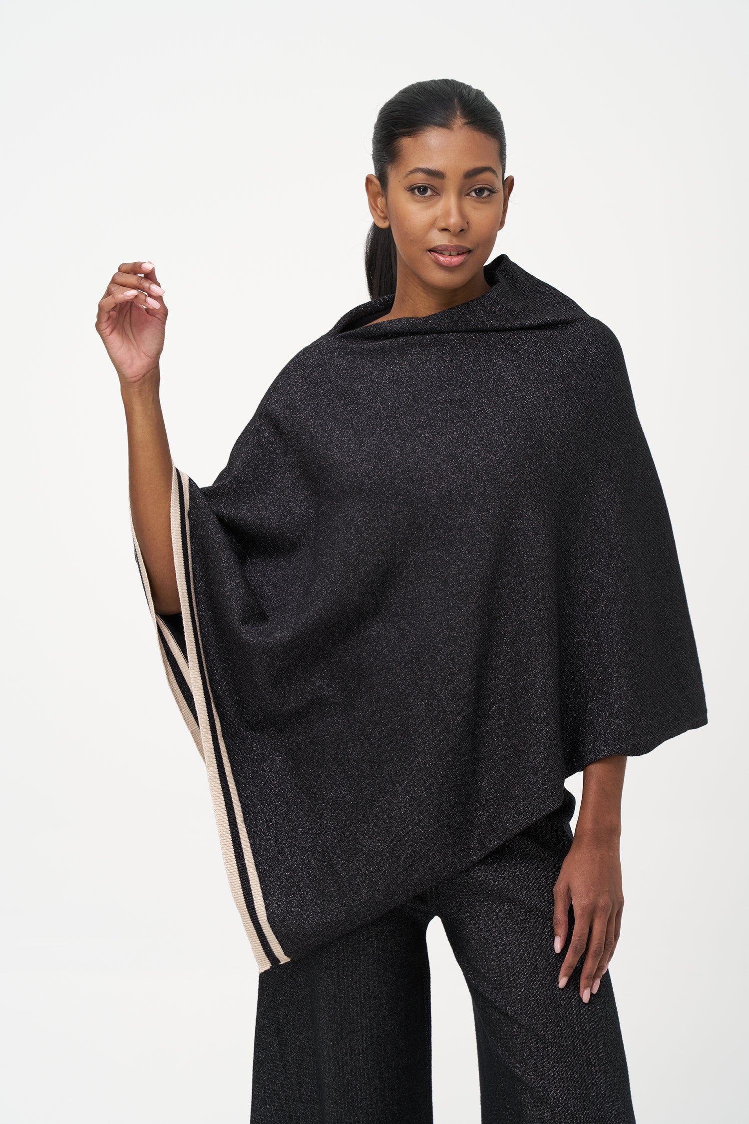 Women's knit poncho (can be worn with a cowl neck at the front, or can be worn diagonaly with a v-front hemline)