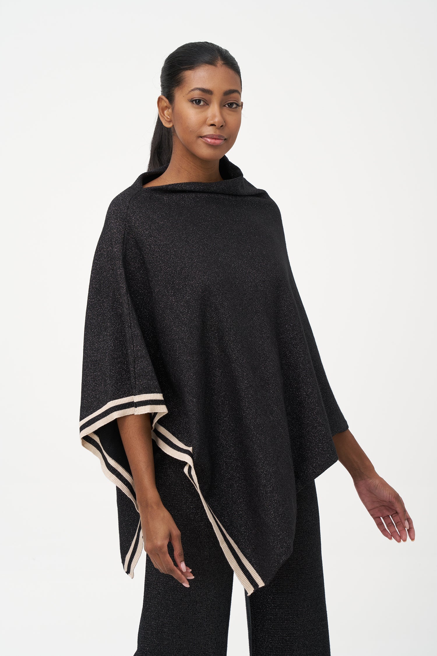 Women's knit poncho (can be worn with a cowl neck at the front, or can be worn diagonaly with a v-front hemline)