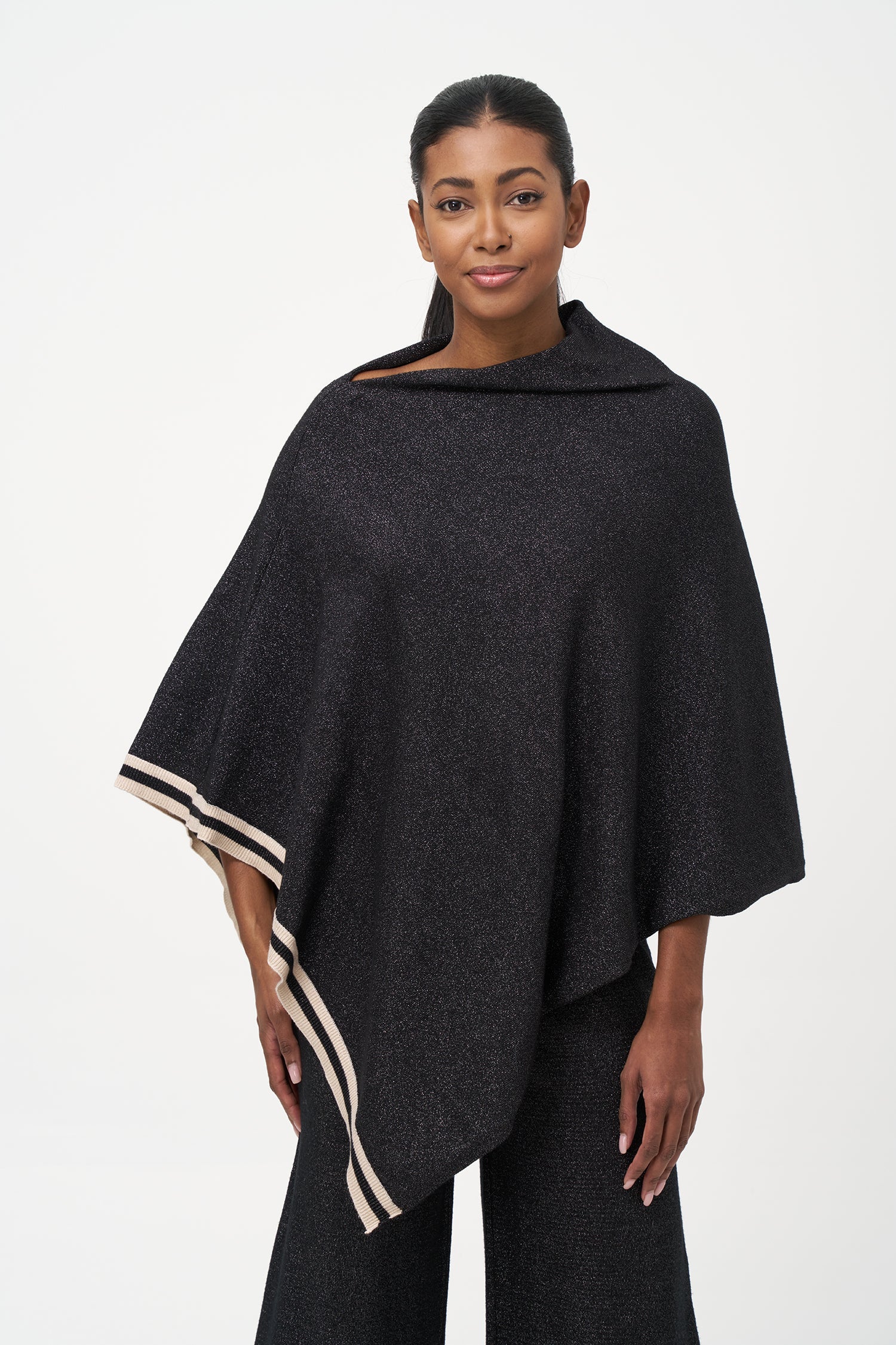 Women's knit poncho (can be worn with a cowl neck at the front, or can be worn diagonaly with a v-front hemline)