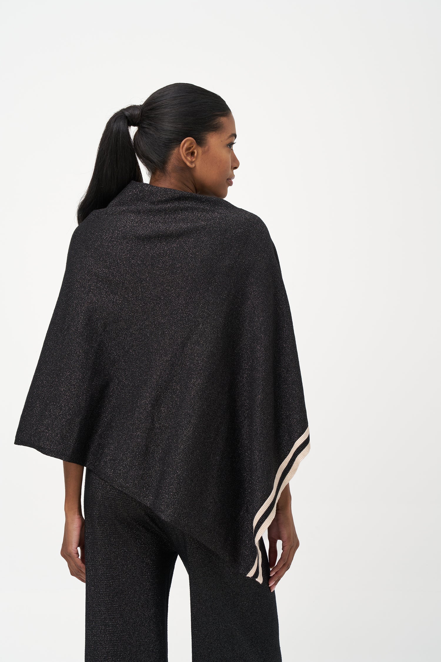 Women's knit poncho (can be worn with a cowl neck at the front, or can be worn diagonaly with a v-front hemline)