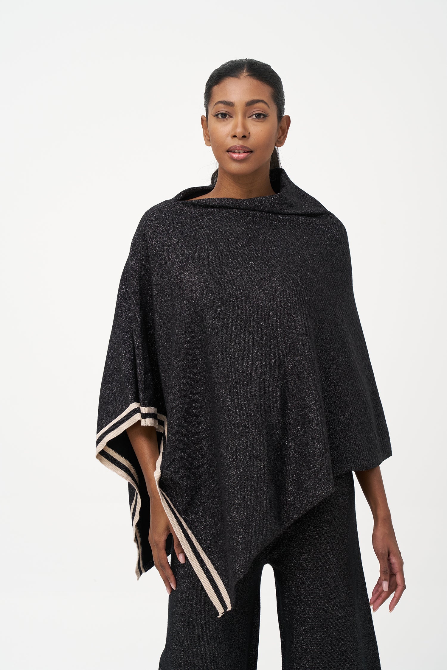 Women's knit poncho (can be worn with a cowl neck at the front, or can be worn diagonaly with a v-front hemline)