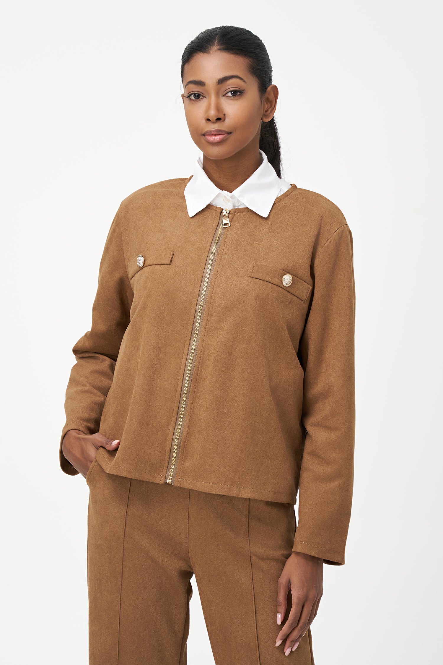 Women's knit zip-up long sleeve crew-neckline jacket, with faux-welt pockets and gold decorative buttons