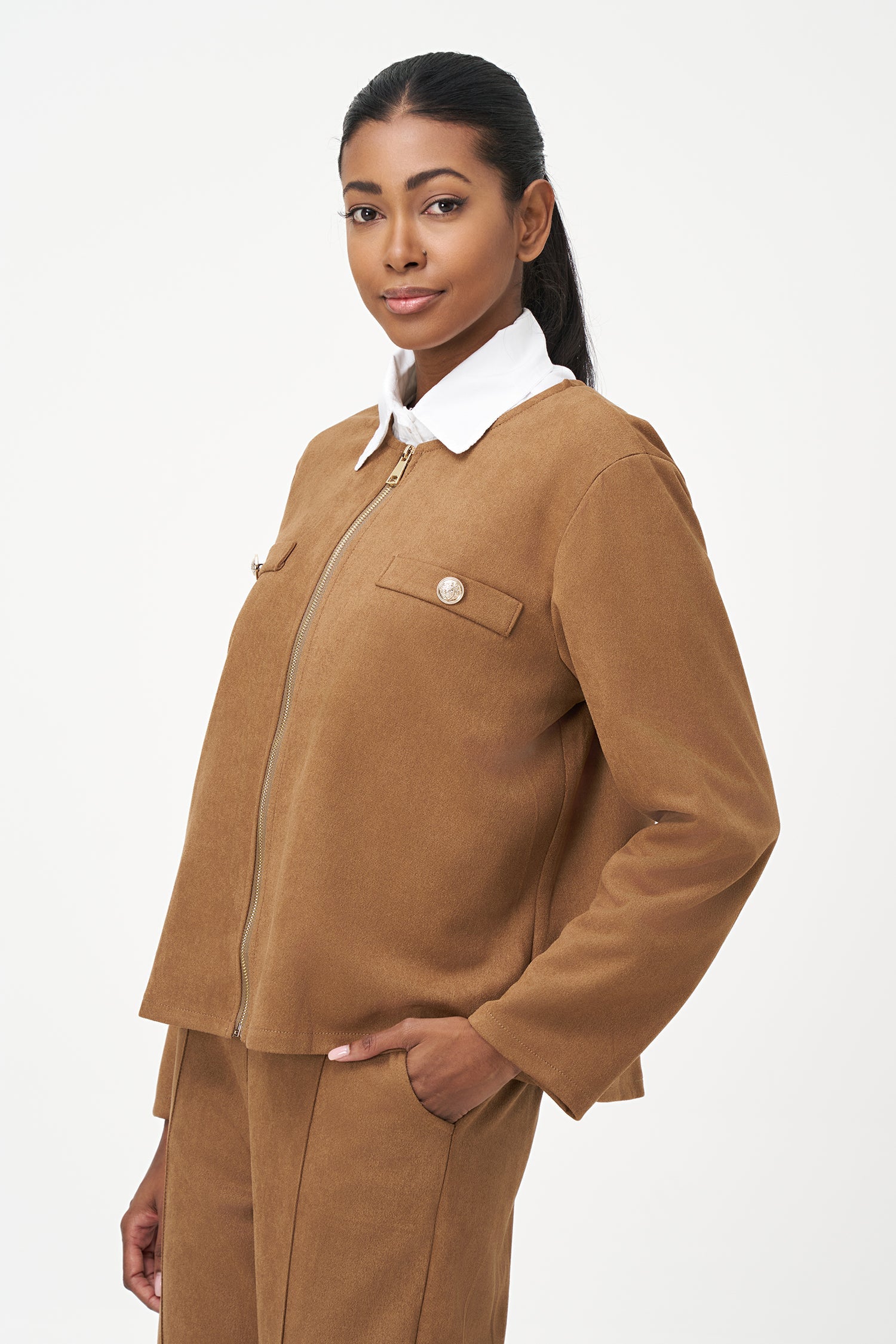 Women's knit zip-up long sleeve crew-neckline jacket, with faux-welt pockets and gold decorative buttons