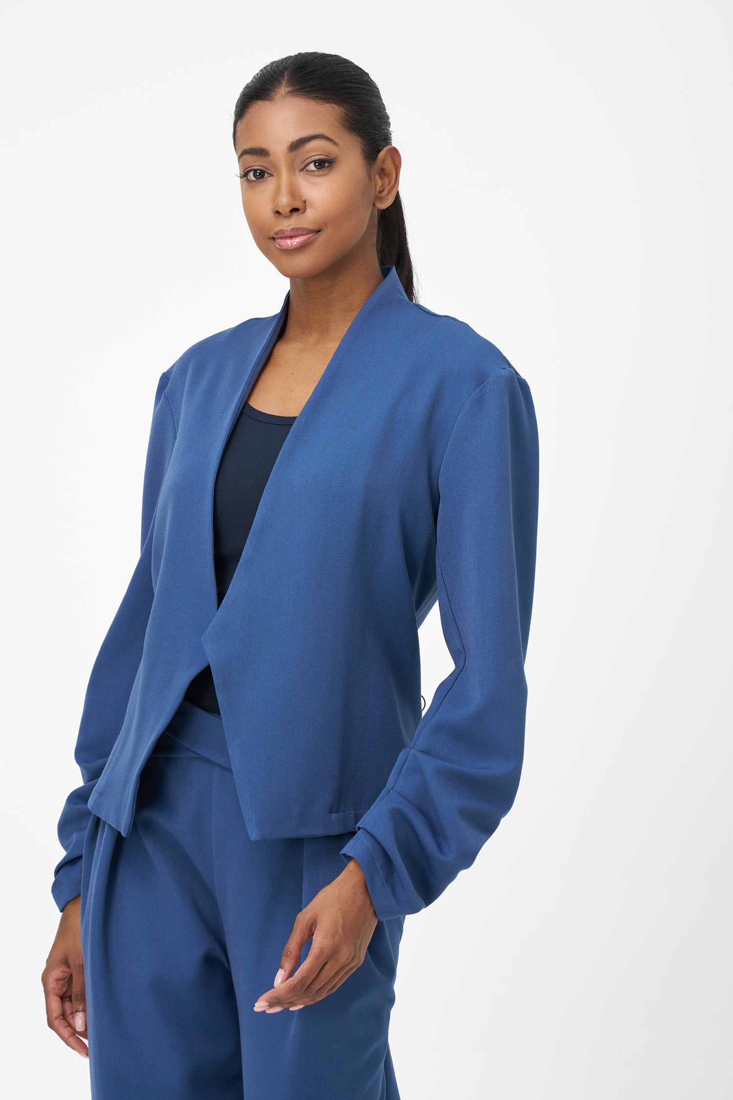 Women’s open woven long sleeve blazer, with gathered sleeves at the wrists
