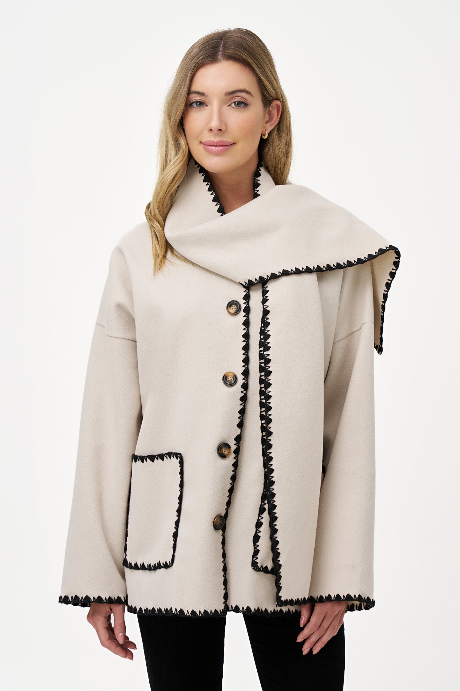 Women's woven button-down hip-length coat, with decorative stitching, patch pockets, and a usable attached scarf