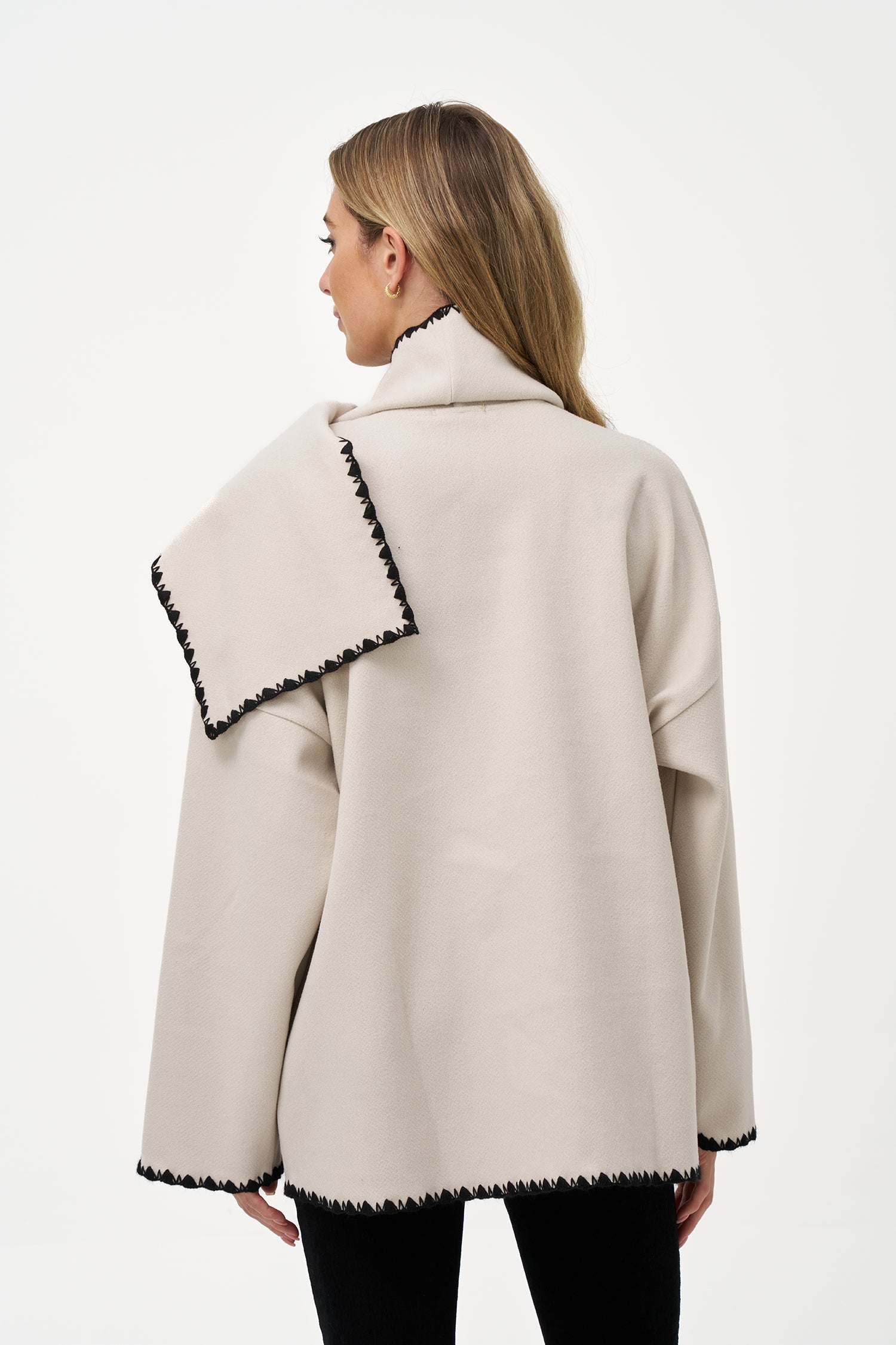 Women's woven button-down hip-length coat, with decorative stitching, patch pockets, and a usable attached scarf