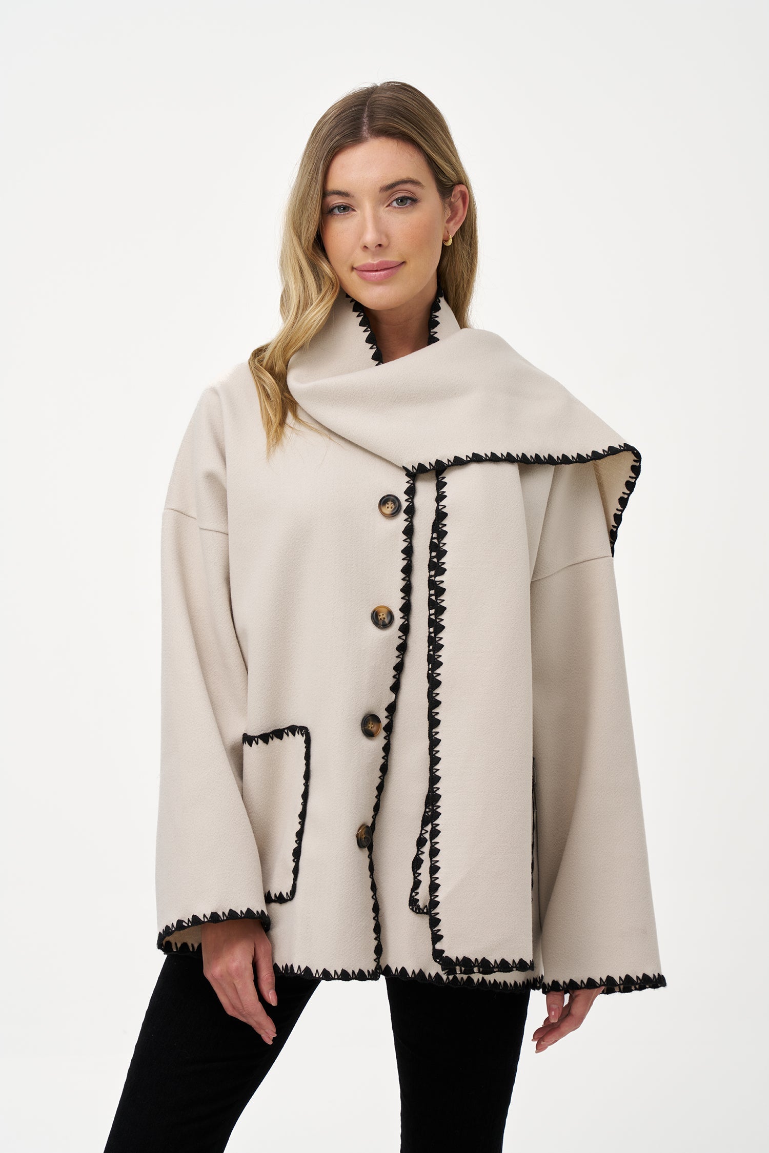 Women's woven button-down hip-length coat, with decorative stitching, patch pockets, and a usable attached scarf