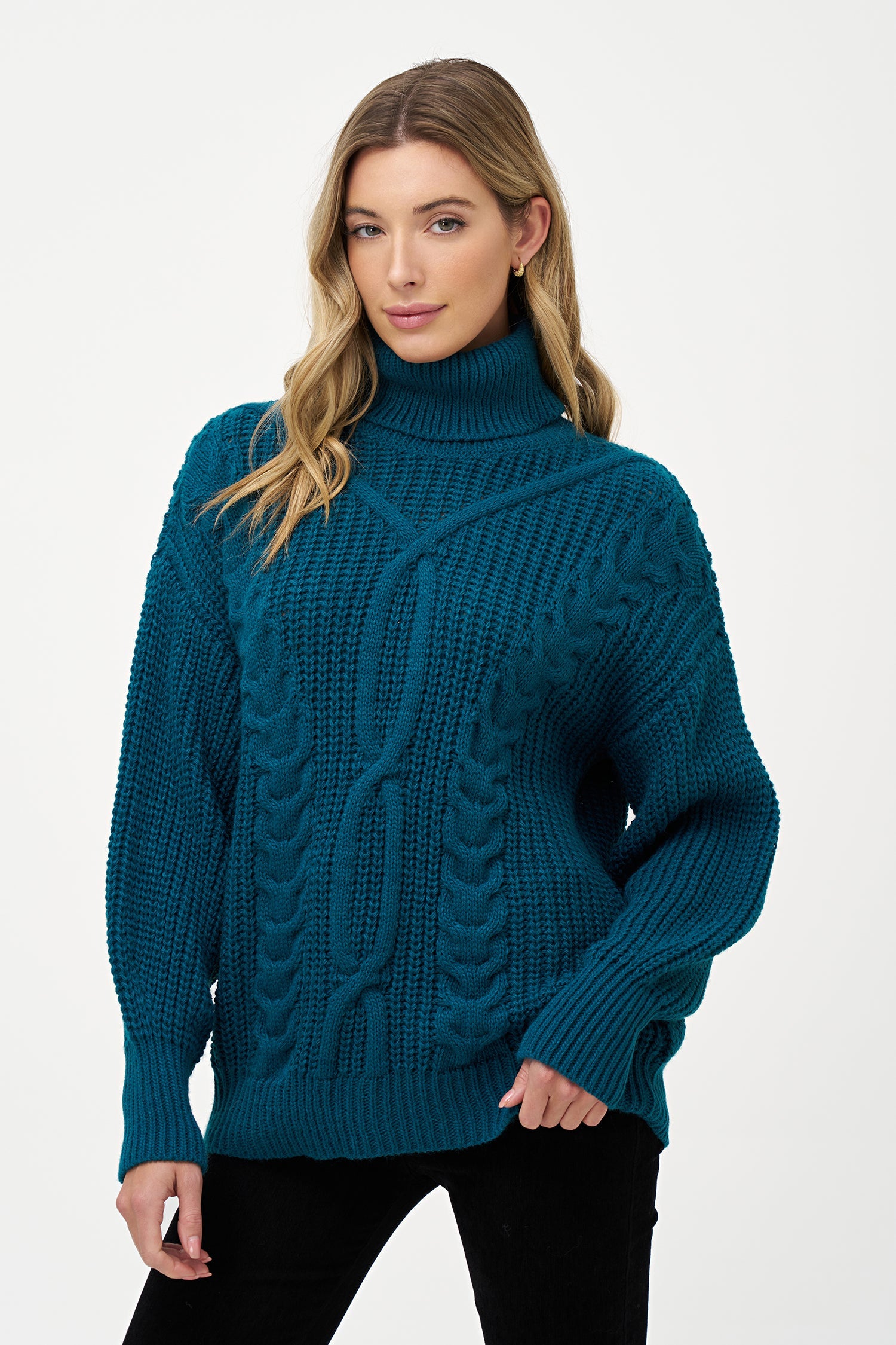 Women’s knit long sleeve turtle-neck sweater, with a front cable detailing