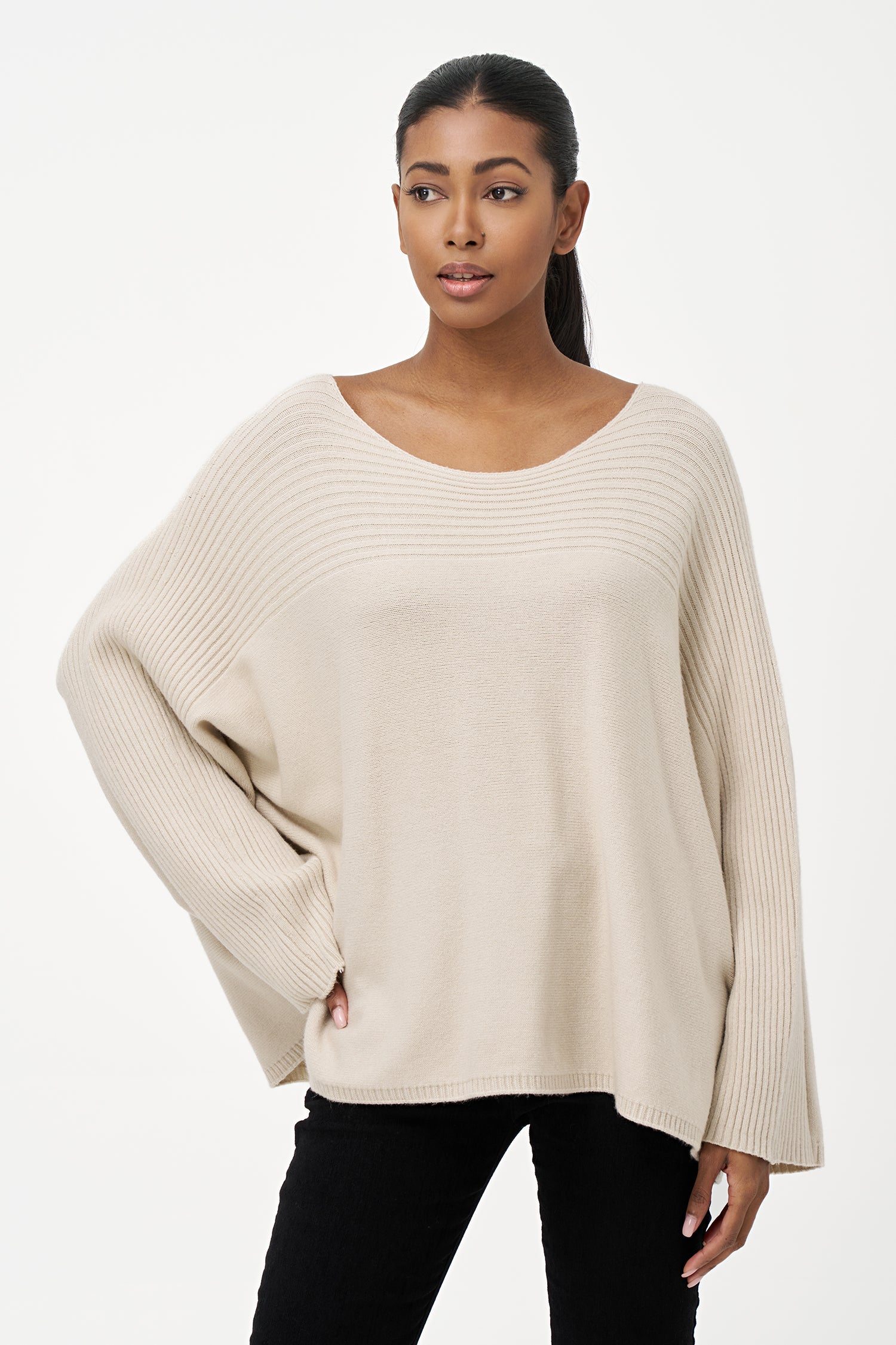 Women’s knit oversized boat-neck sweater, with a horizontal rib detailing and long sleeves