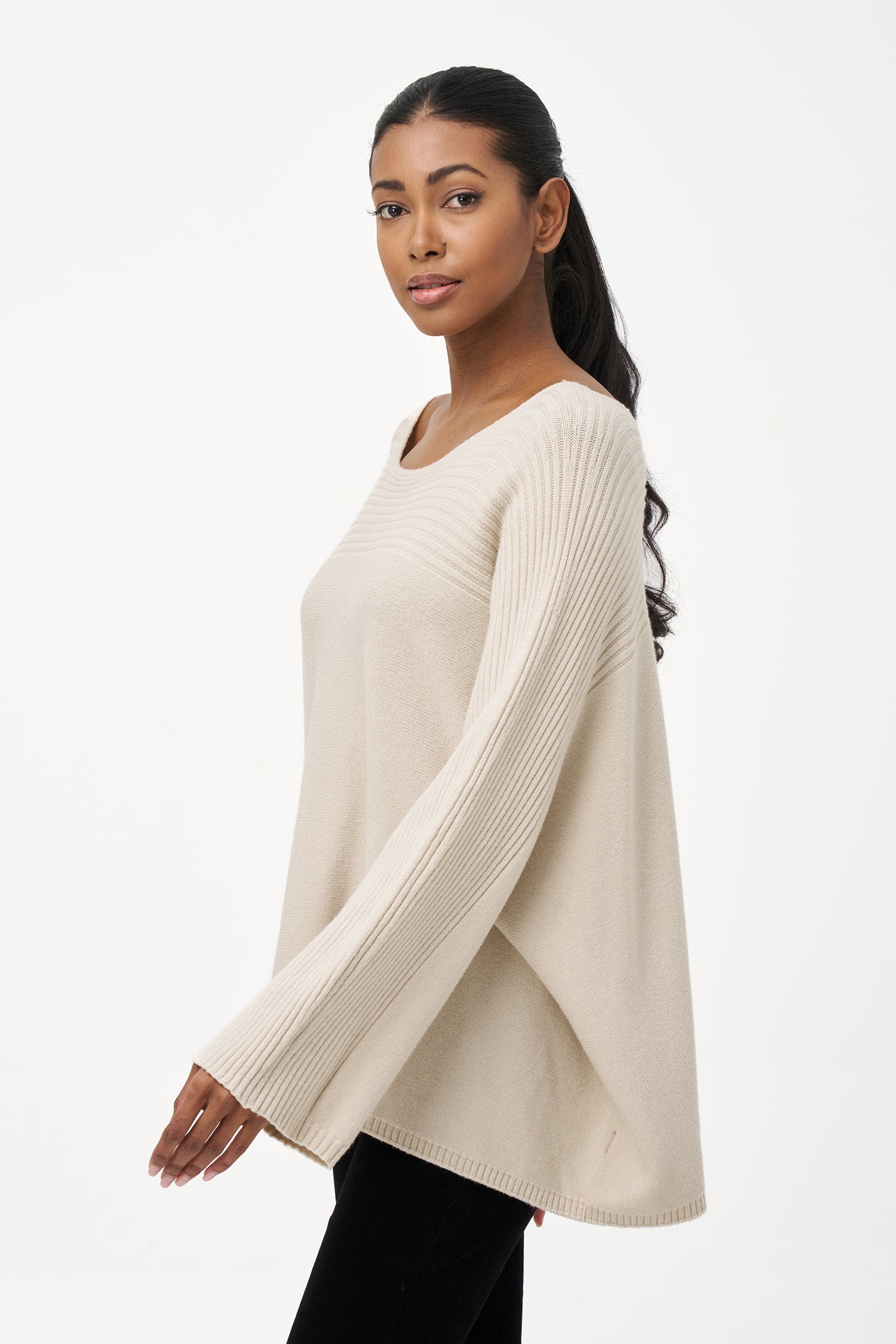 Women’s knit oversized boat-neck sweater, with a horizontal rib detailing and long sleeves