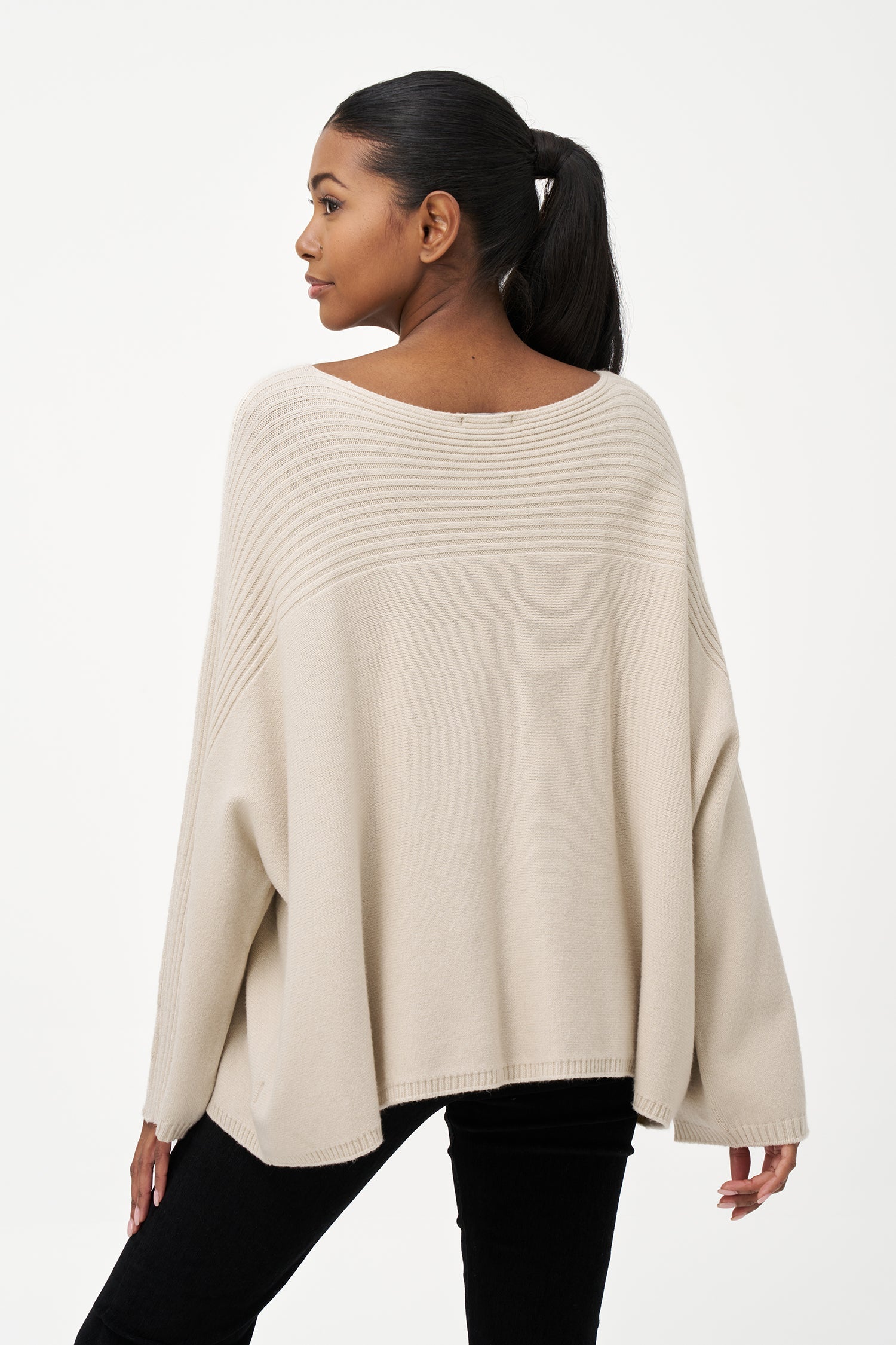 Women’s knit oversized boat-neck sweater, with a horizontal rib detailing and long sleeves