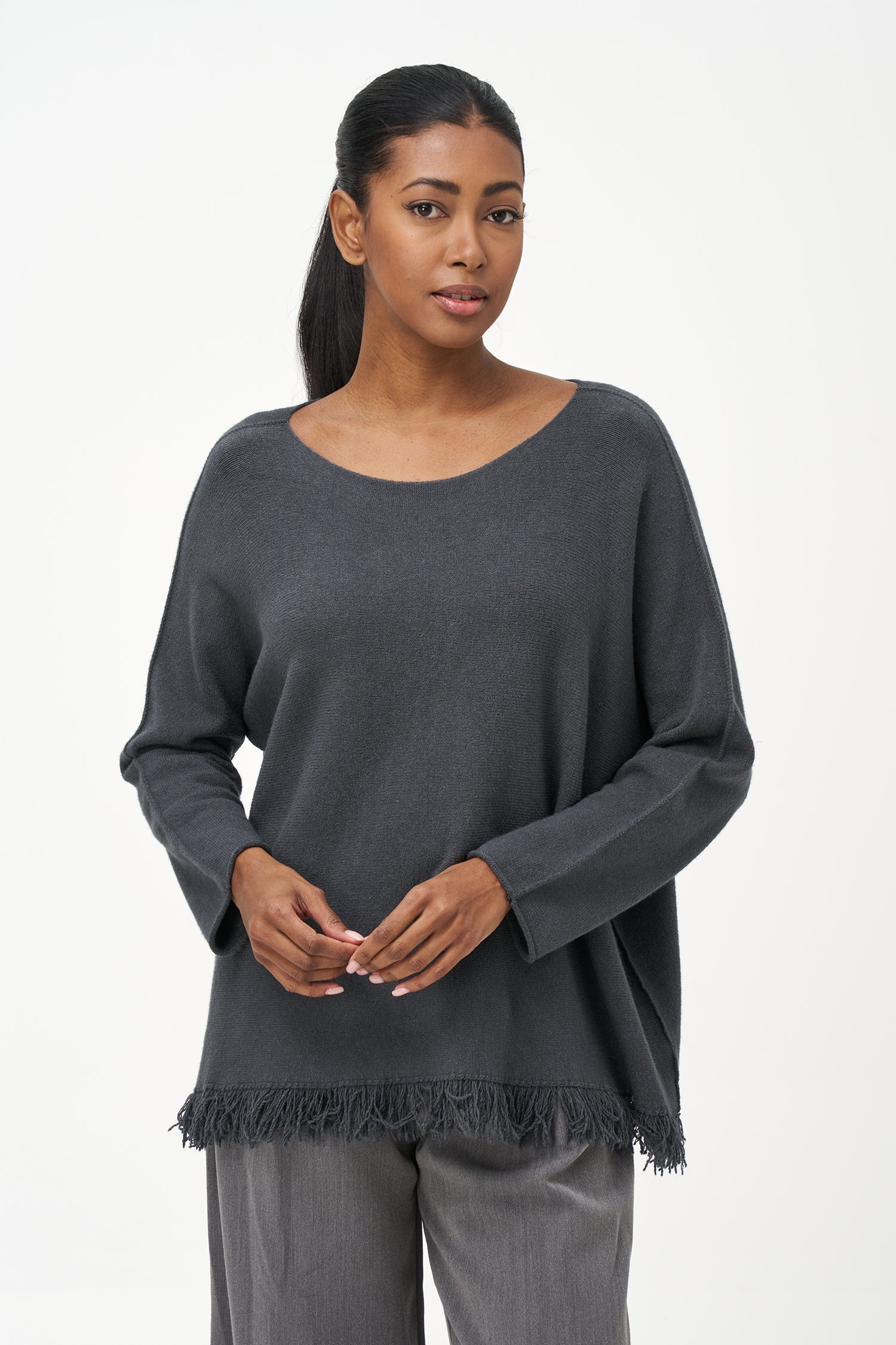 Women’s boat-neck long sleeve sweater, with fringe detailing at the hemline