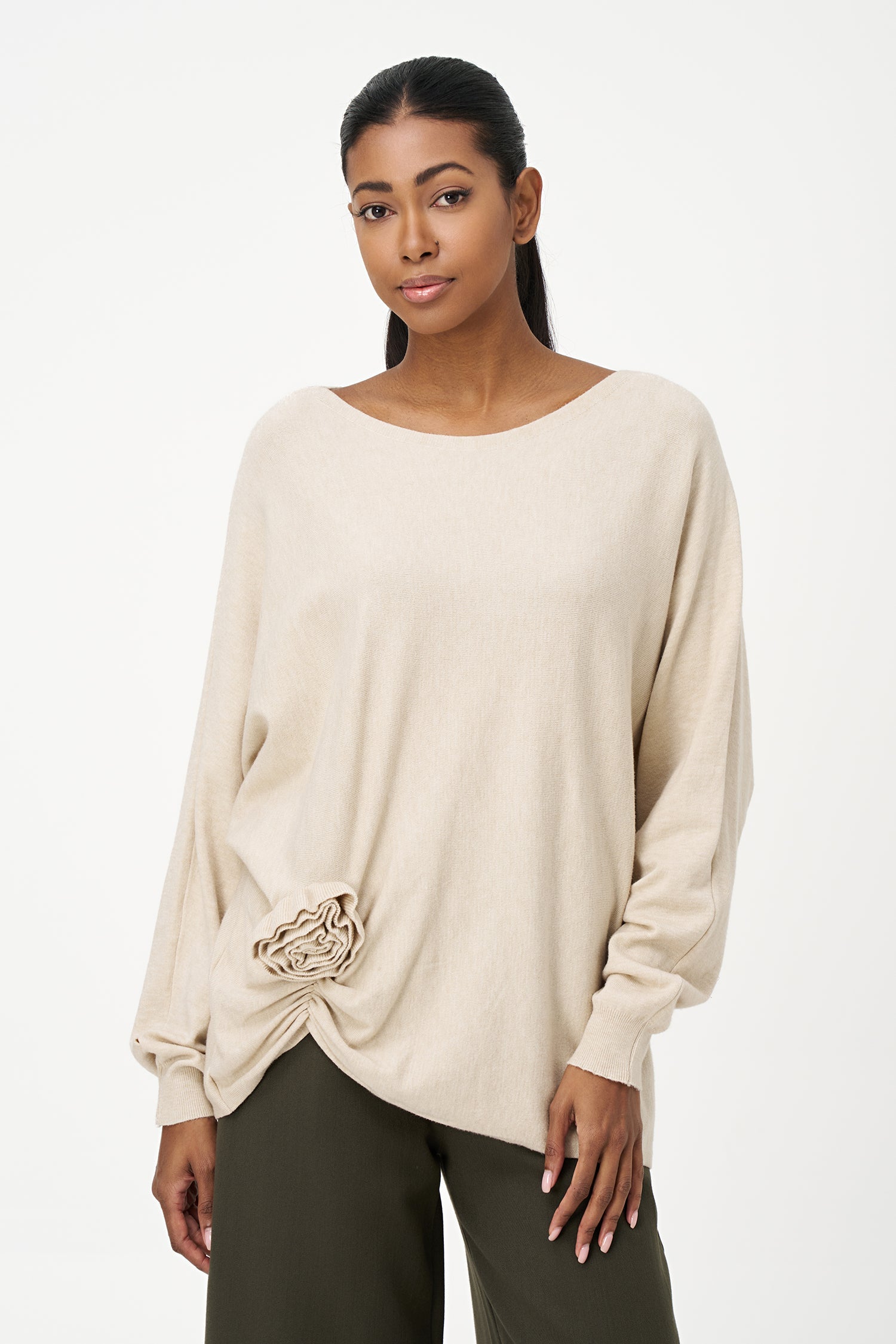 Women's knit long sleeve wide-neck sweater, with an attached flower detail