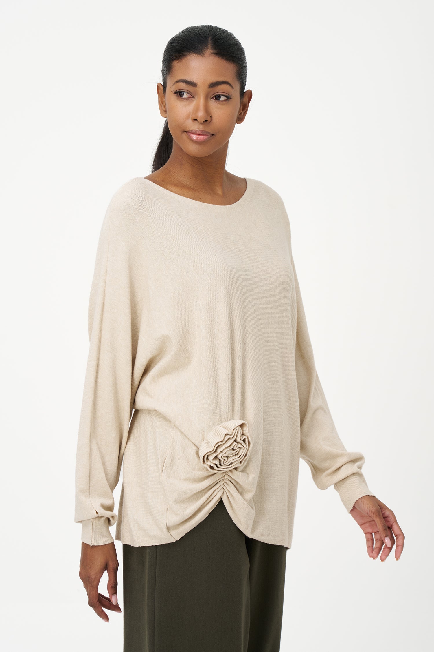Women's knit long sleeve wide-neck sweater, with an attached flower detail
