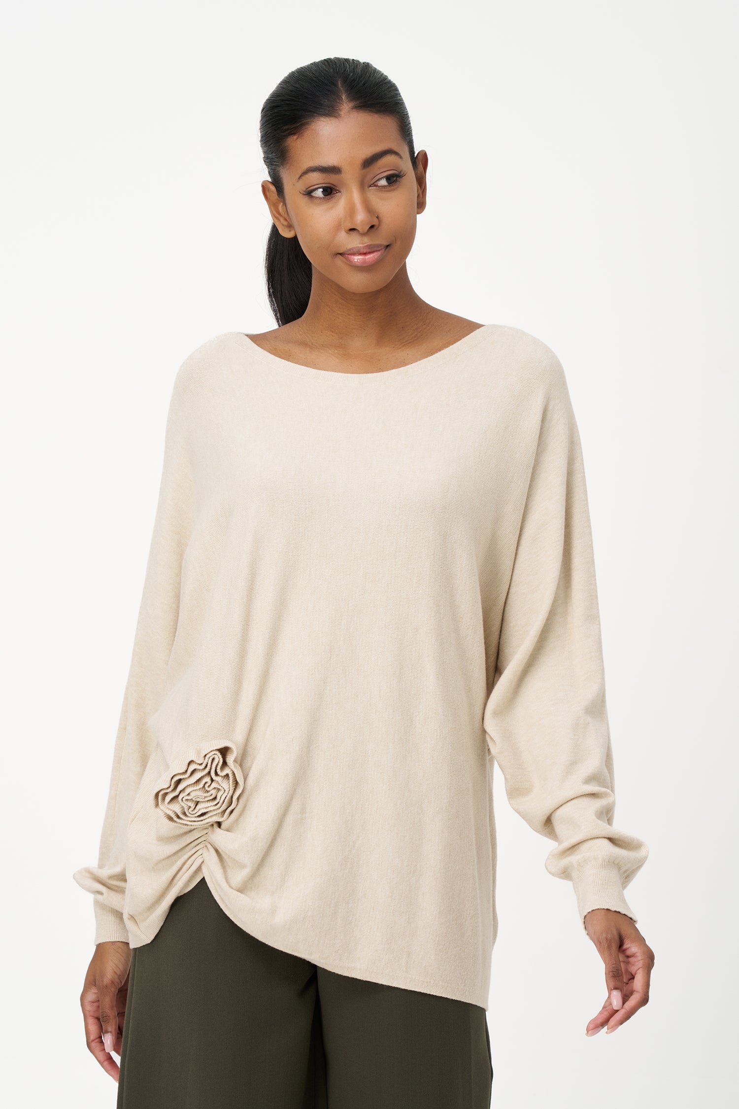 Women's knit long sleeve wide-neck sweater, with an attached flower detail