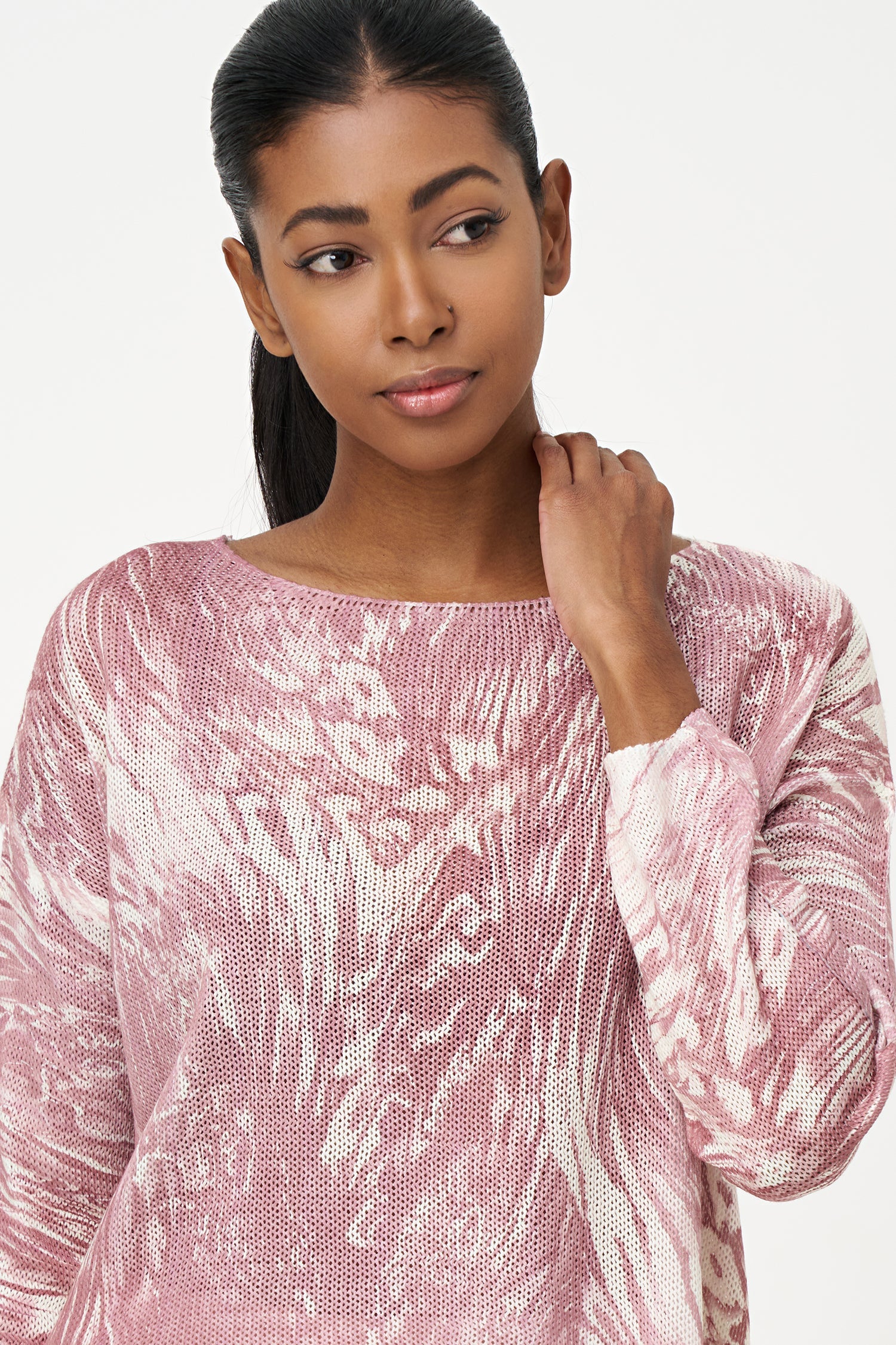 Women's knit boat-neck sweater, with long sleeves and a shark-bite hemline