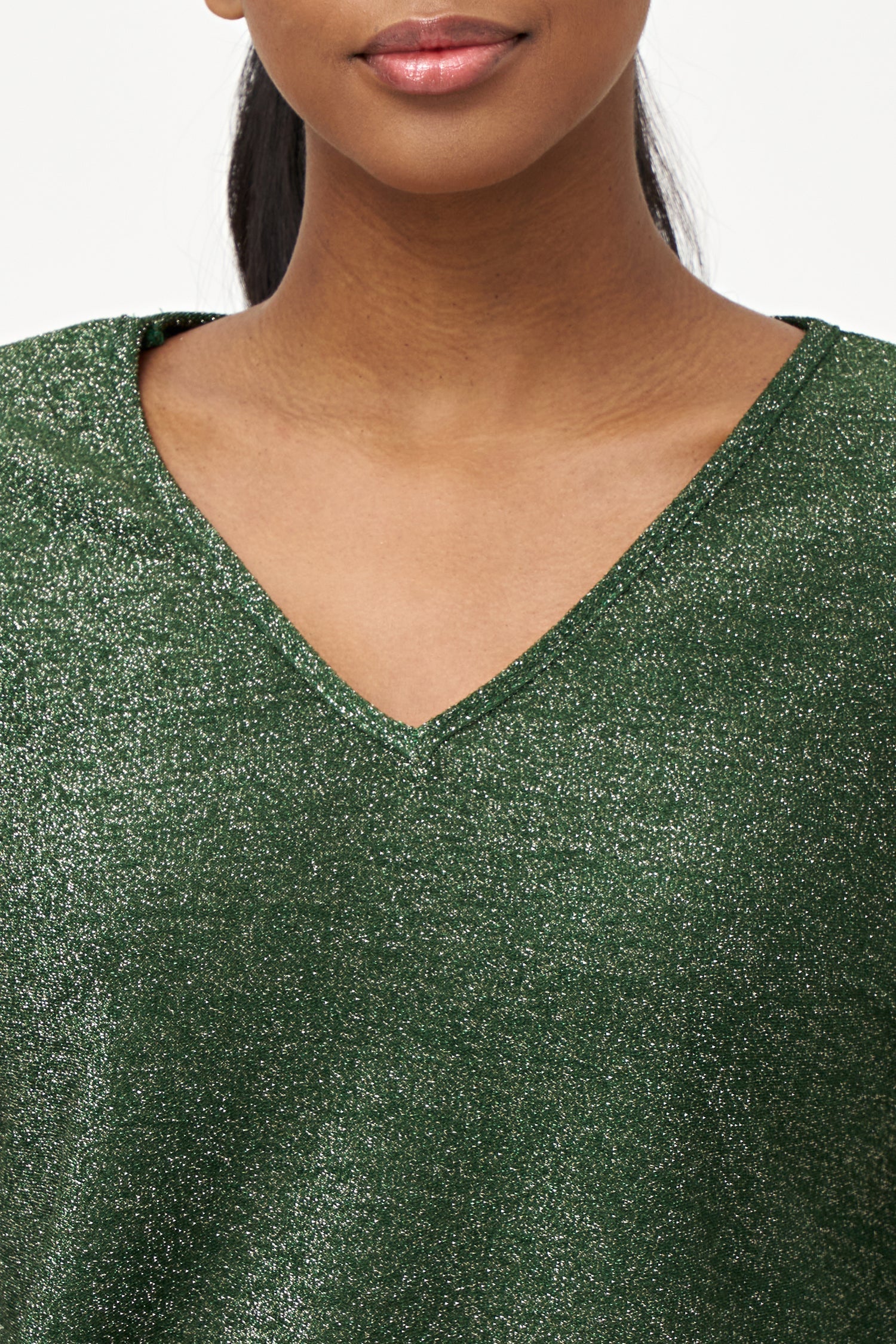 Women’s knit long sleeve top, with v-neckline