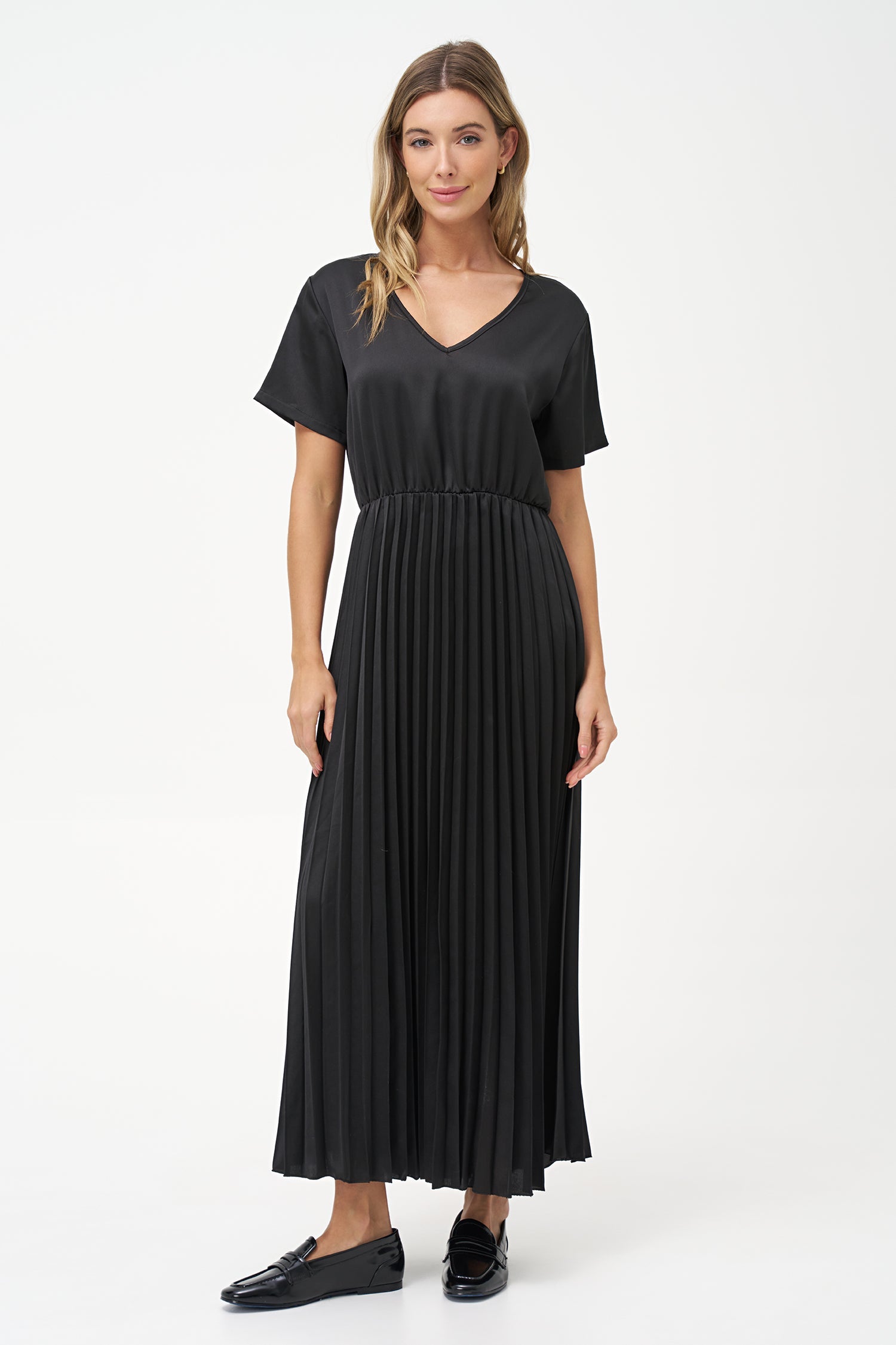 Women’s woven v-neckline short sleeve dress. a plain top half with a pleated bottom half