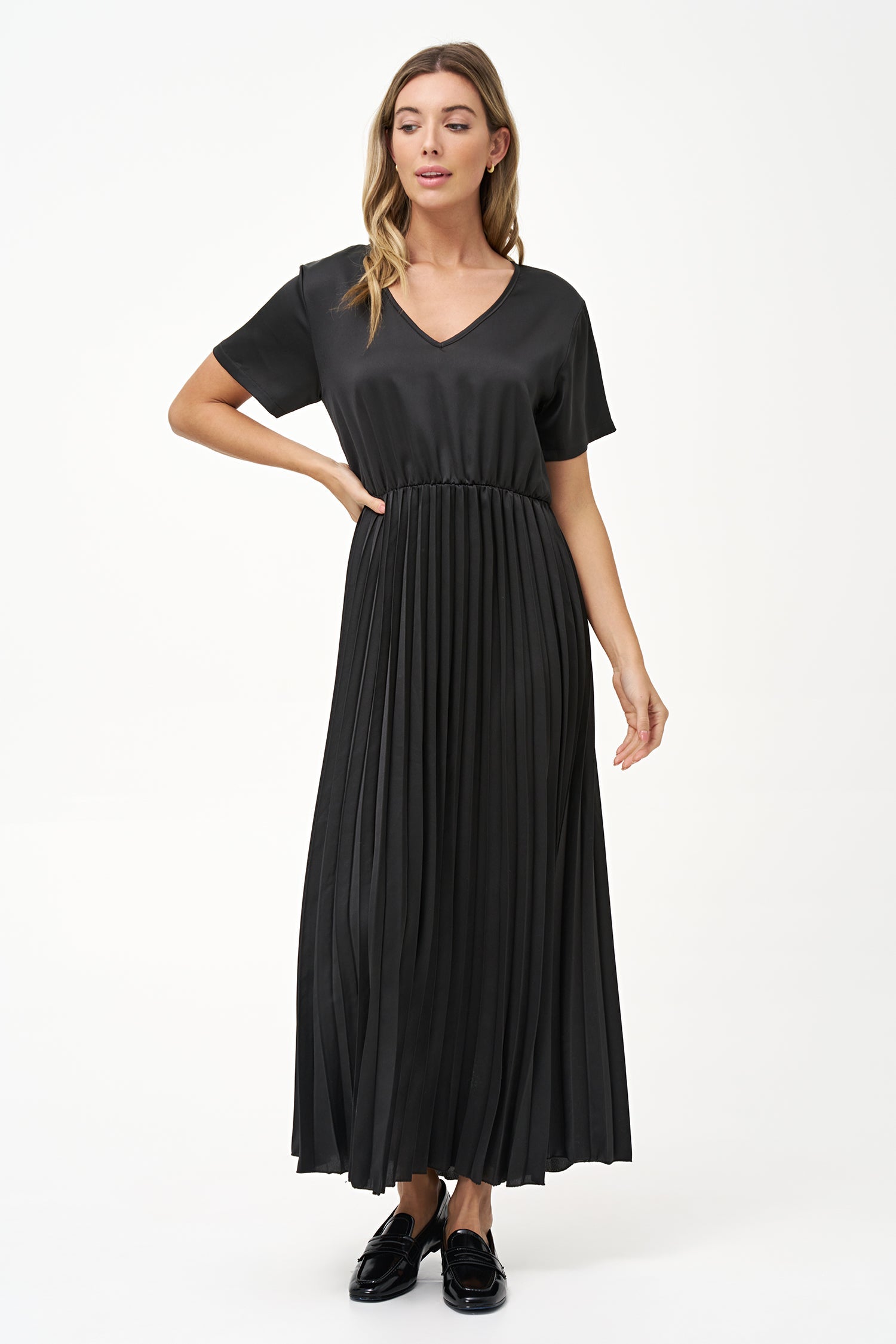 Women’s woven v-neckline short sleeve dress. a plain top half with a pleated bottom half