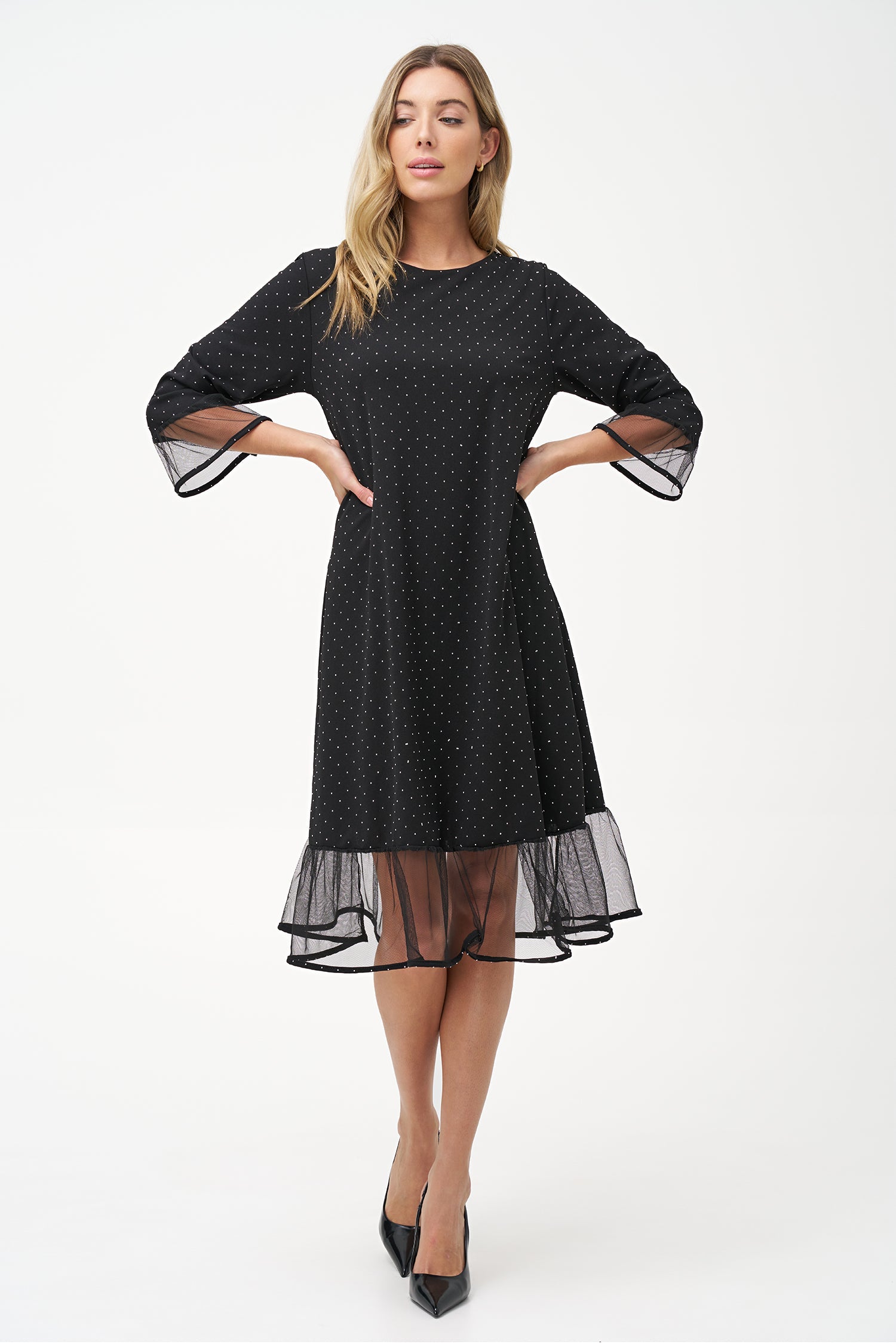 Women's knit crew-neck dress, with elbow-length sleeves, decorative studs and mesh detailing